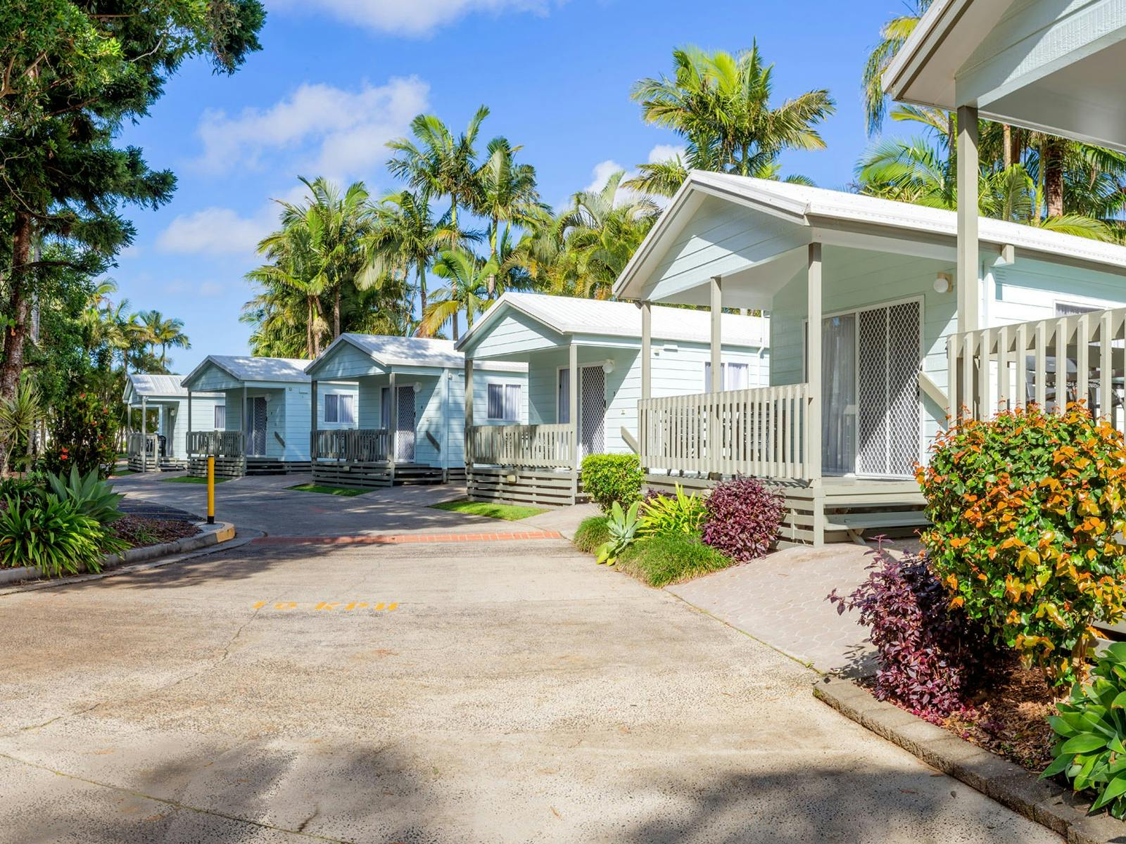 Image of holiday cabins within a caravan park