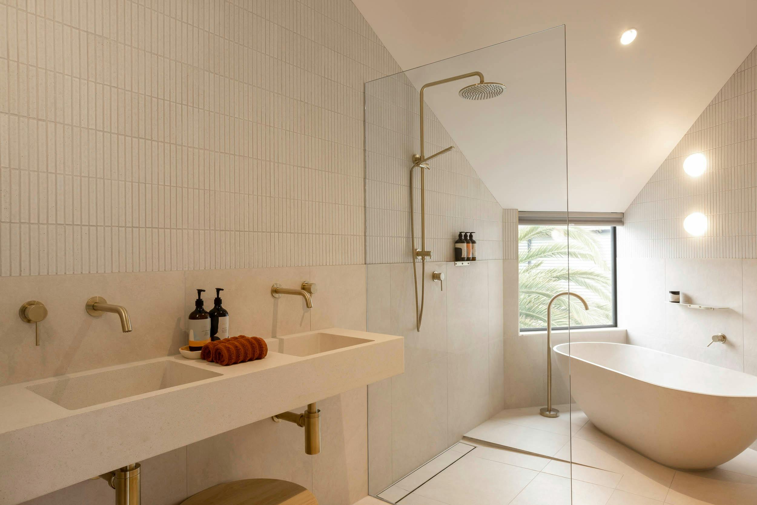 The main bathroom with shower and bath in Jane's