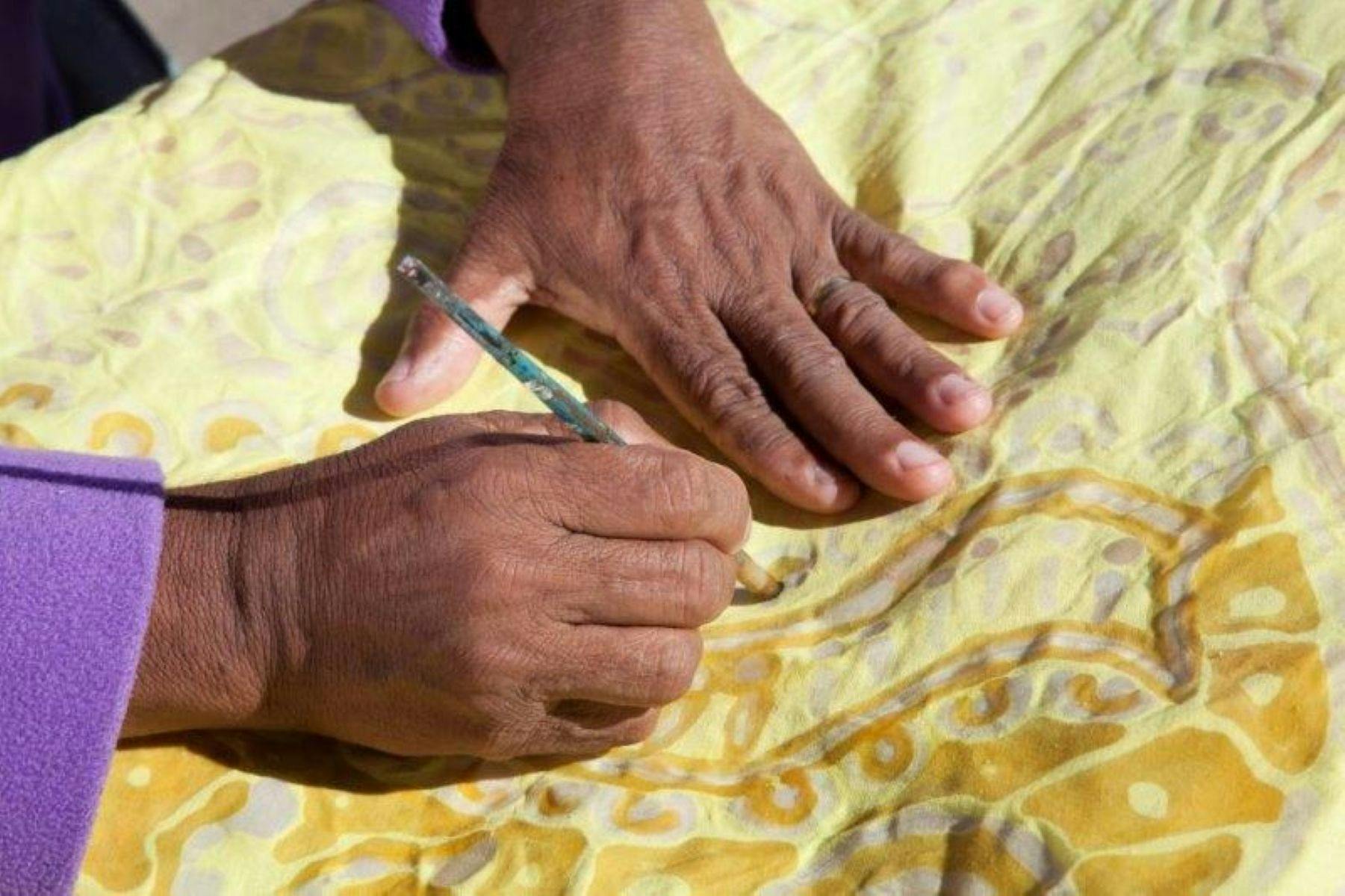 Ladies hands doing art