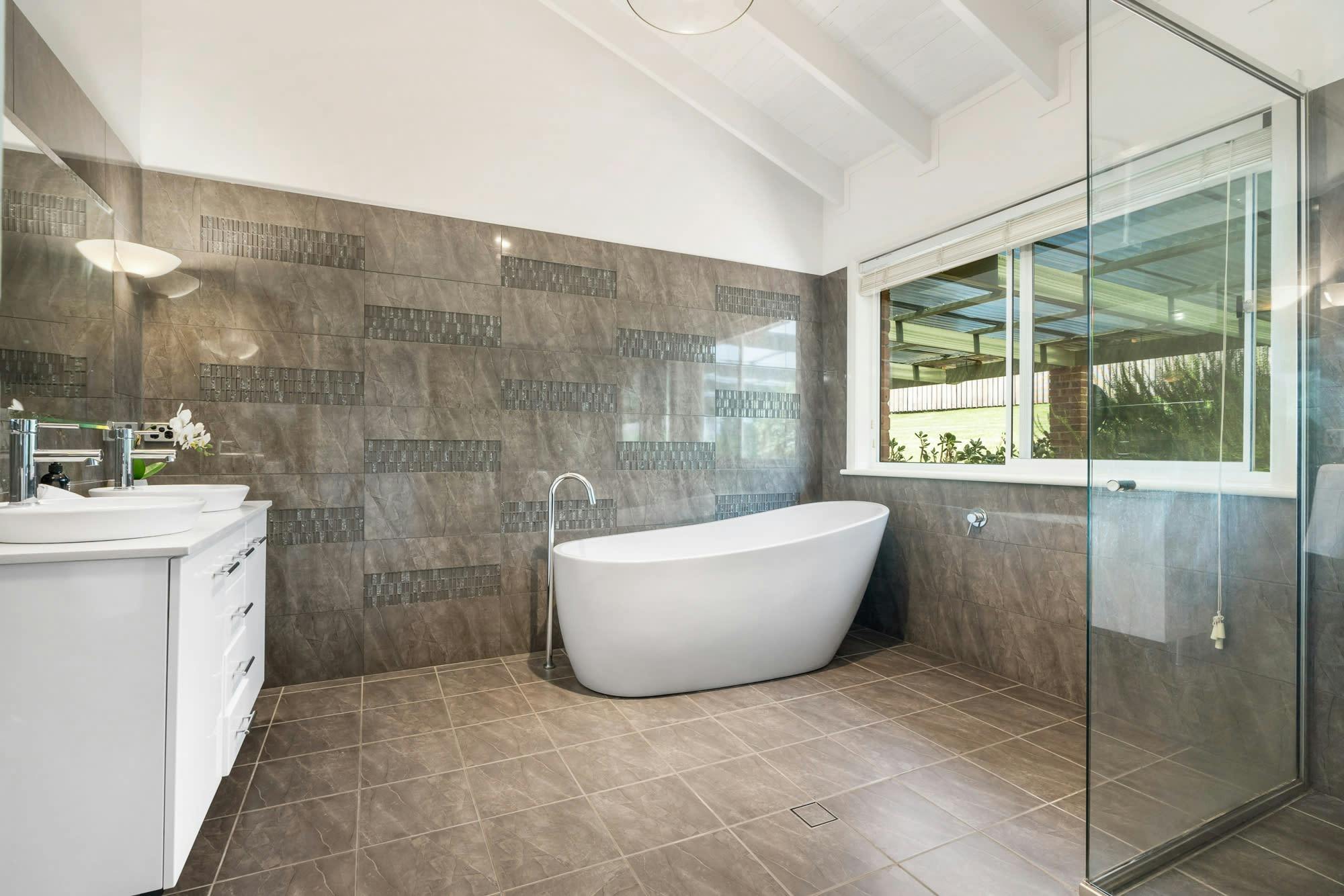 Bathroom with bath, shower, toilet