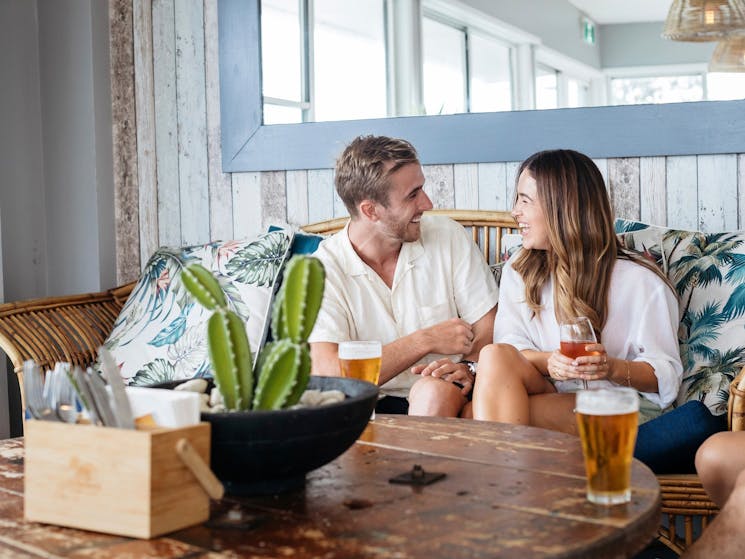 Couple enjoying drinks at Margarita Daze, Umina Beach