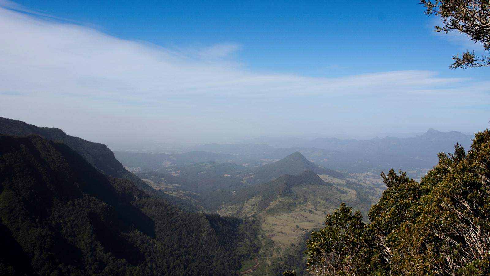 View of valley, mountains and farmland.