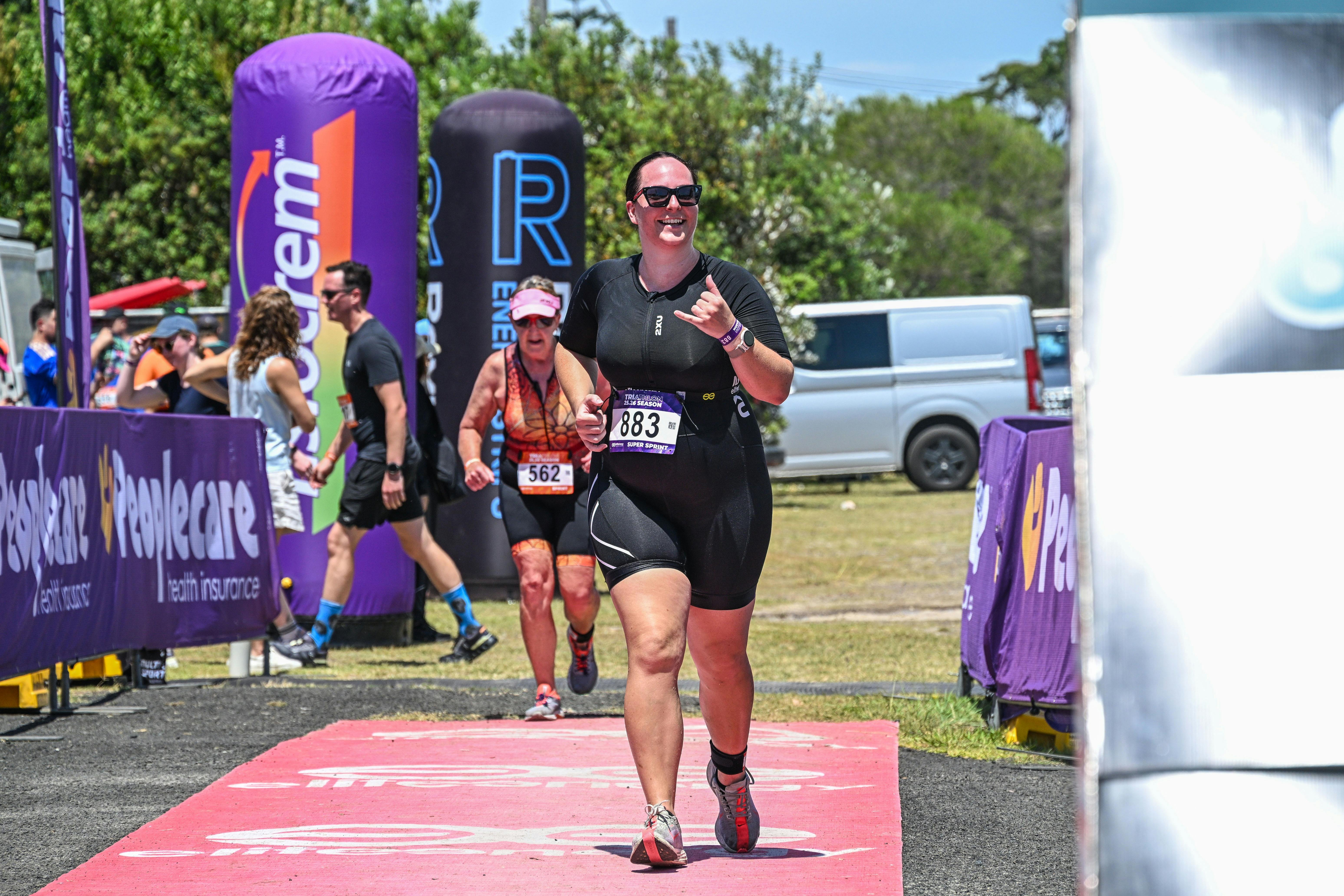 Athlete smiling finish line