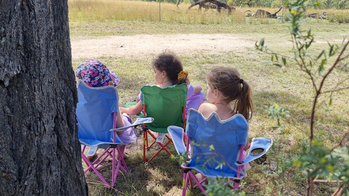 Some girls in their camp chairs