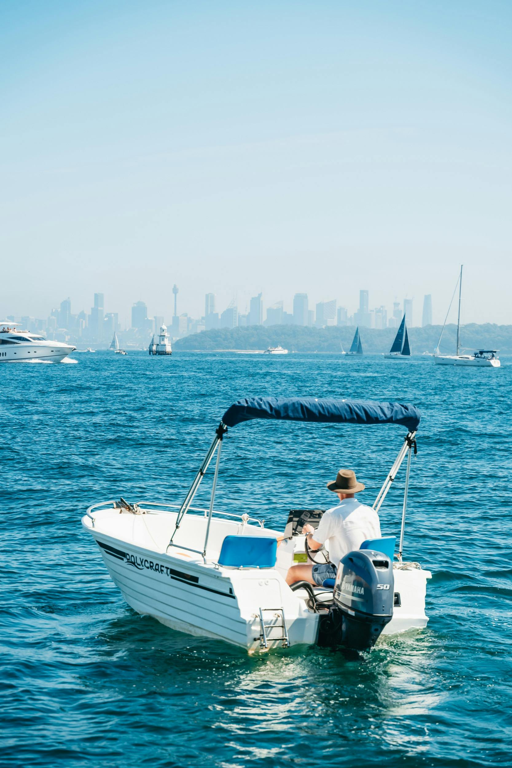 Drive yourself vessel with city backdrop