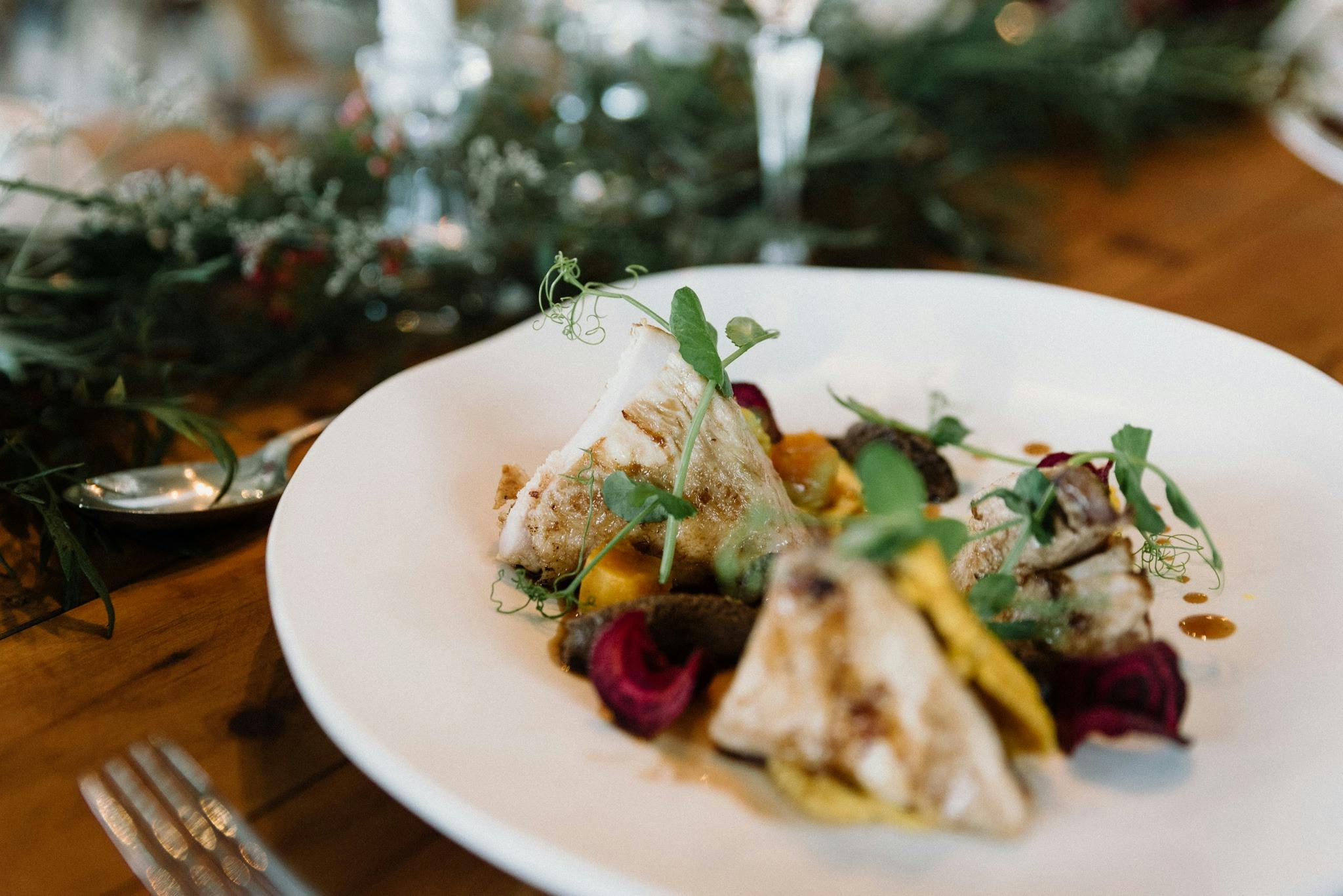 Humpty Doo Barramundi white bean cassoulet, crispy kale, lemon foam, red velvet tuile