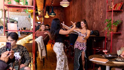 Belly dancer with customer at Bar Beirut
