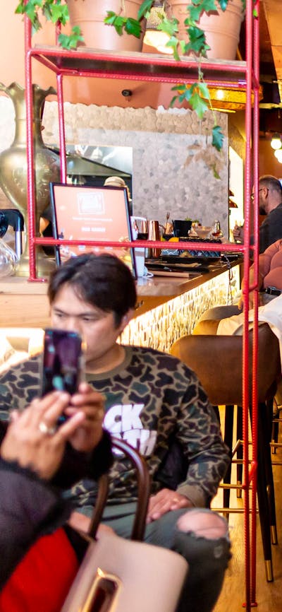 Belly dancer with customer at Bar Beirut