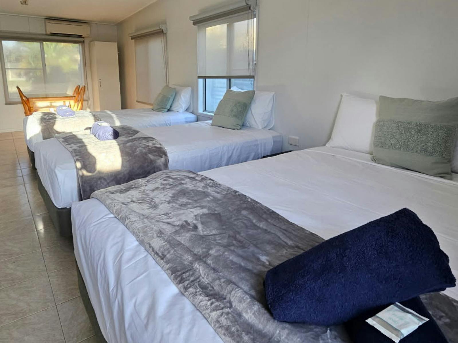 Queen bed and 2 x Single Beds