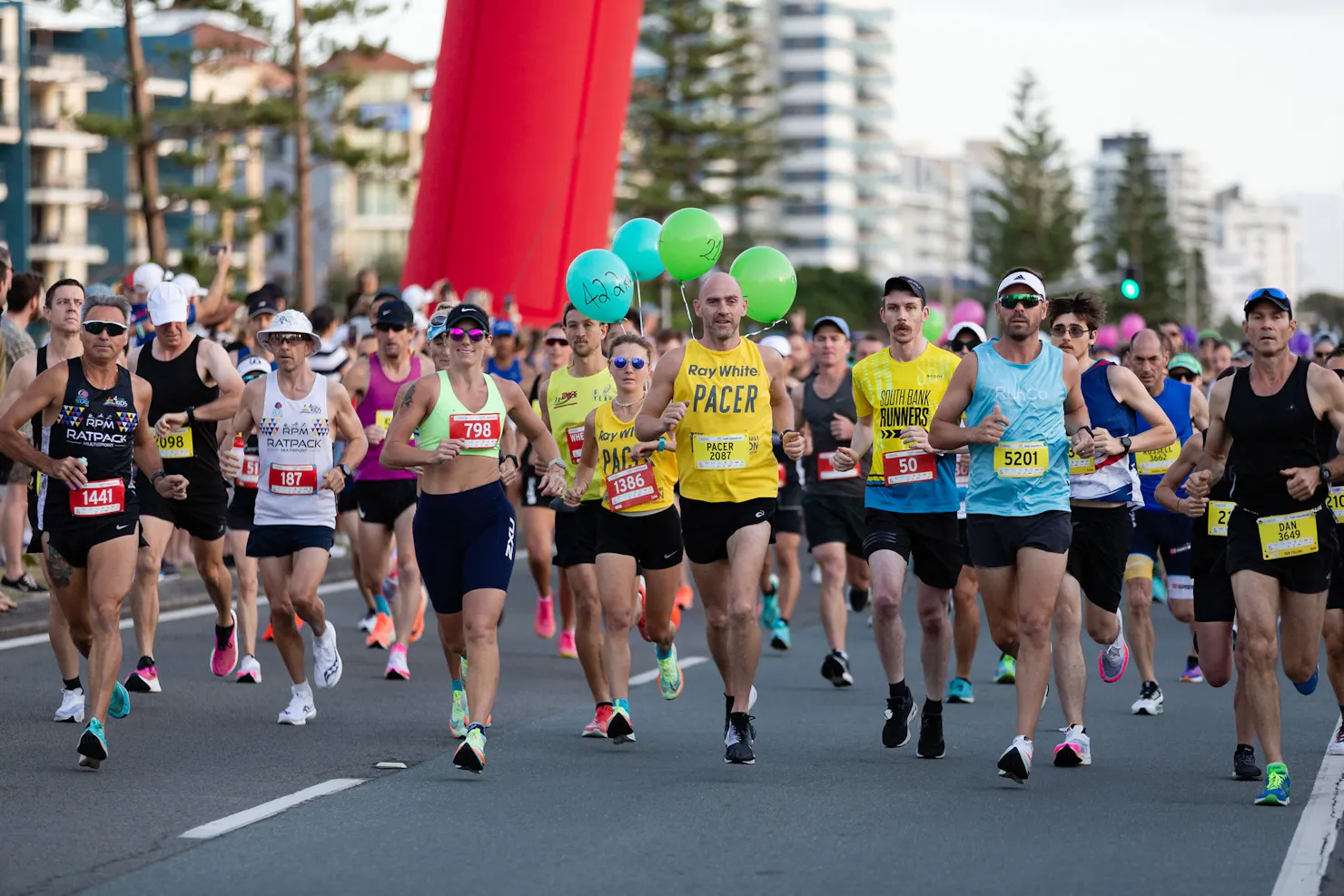 group of runners on the start line of a race