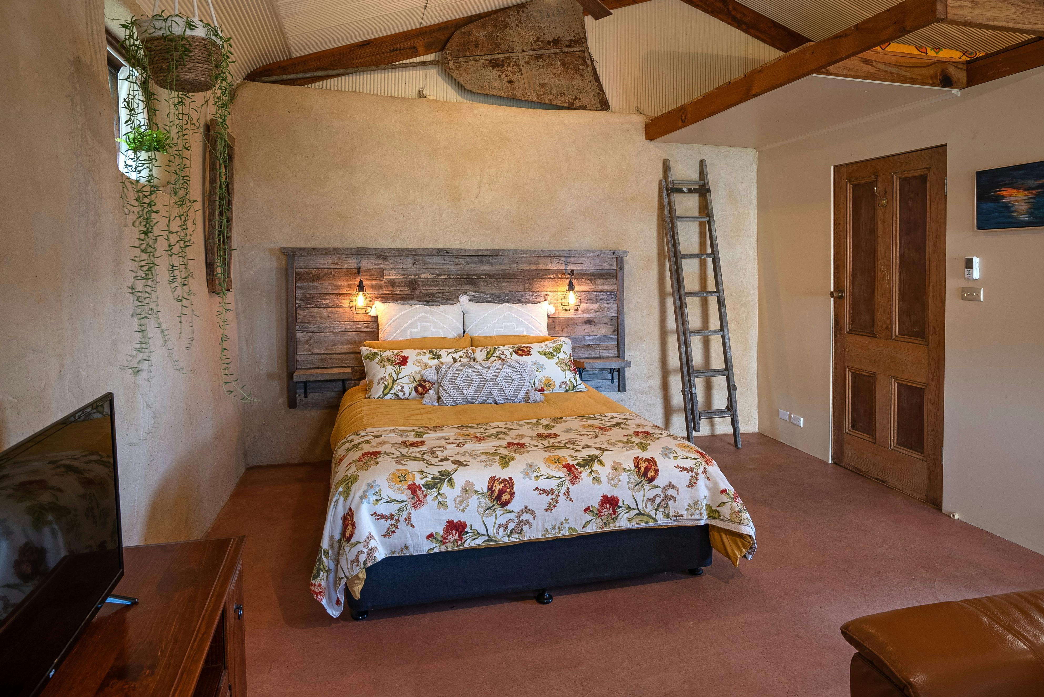 Queen size bed featuring quality linens