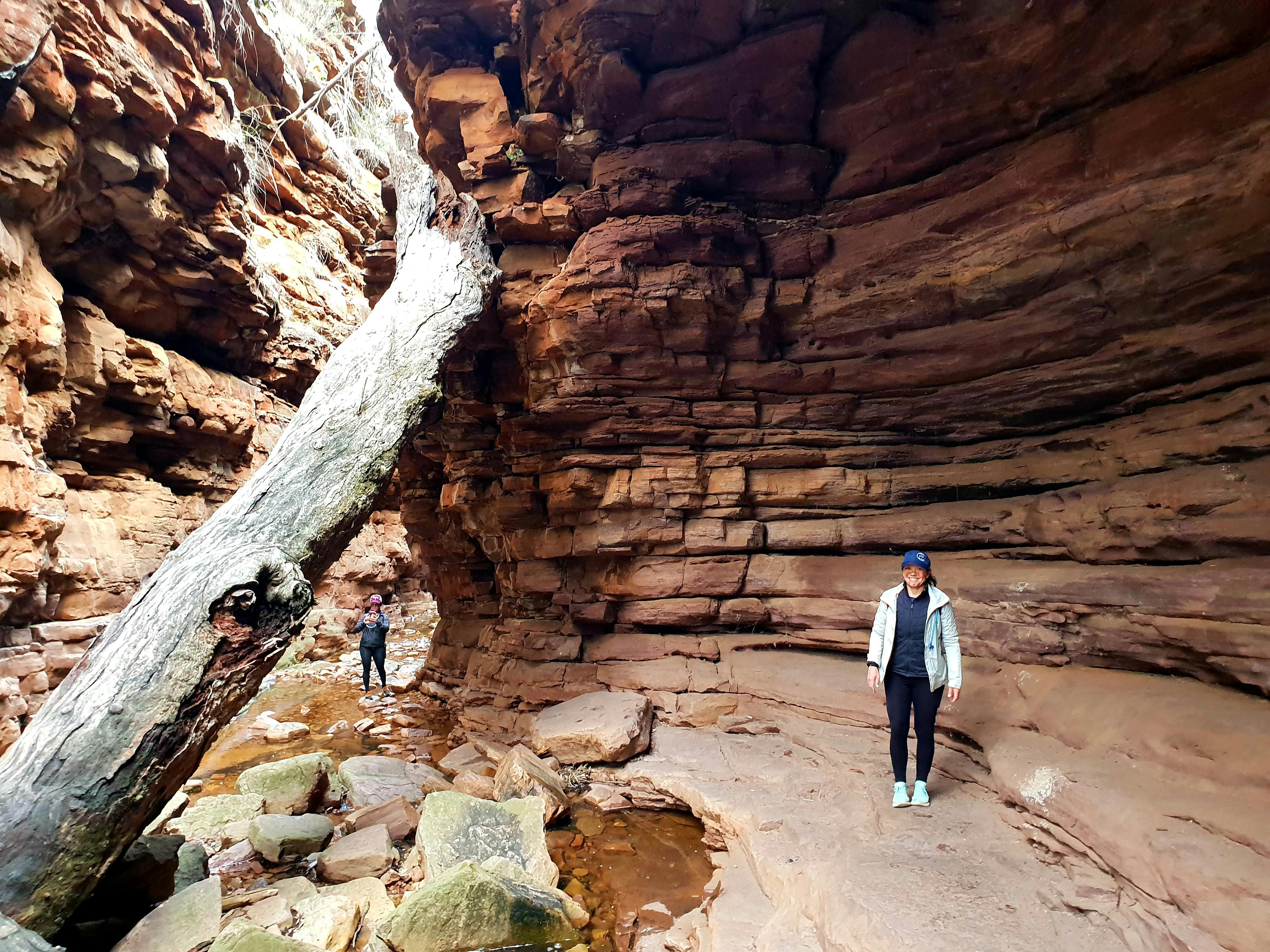 Person standing un der Open Cave in the Narrows
