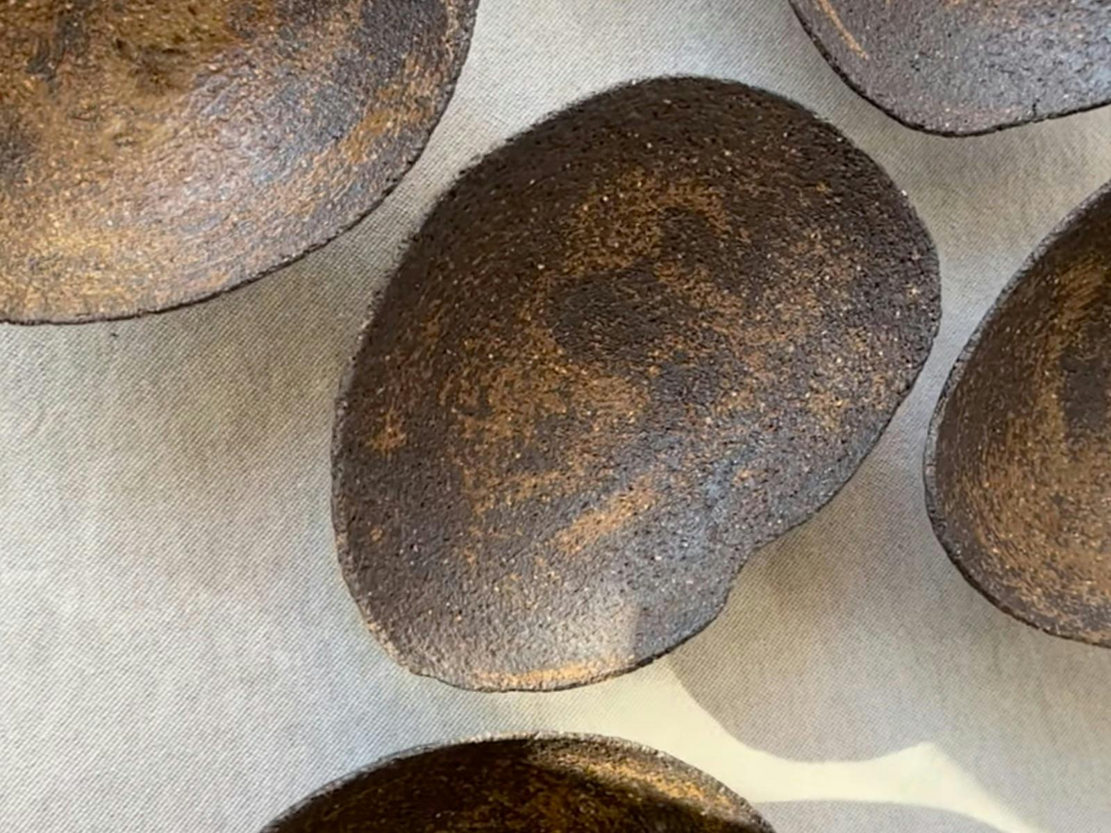 A dark coloured ceramic platter