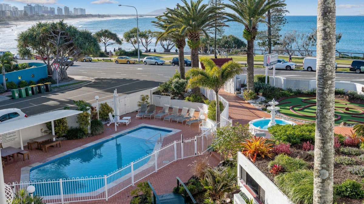 Alexandria Apartments - view of the grounds and beach Alexandria Apartments - view of the grounds and beach