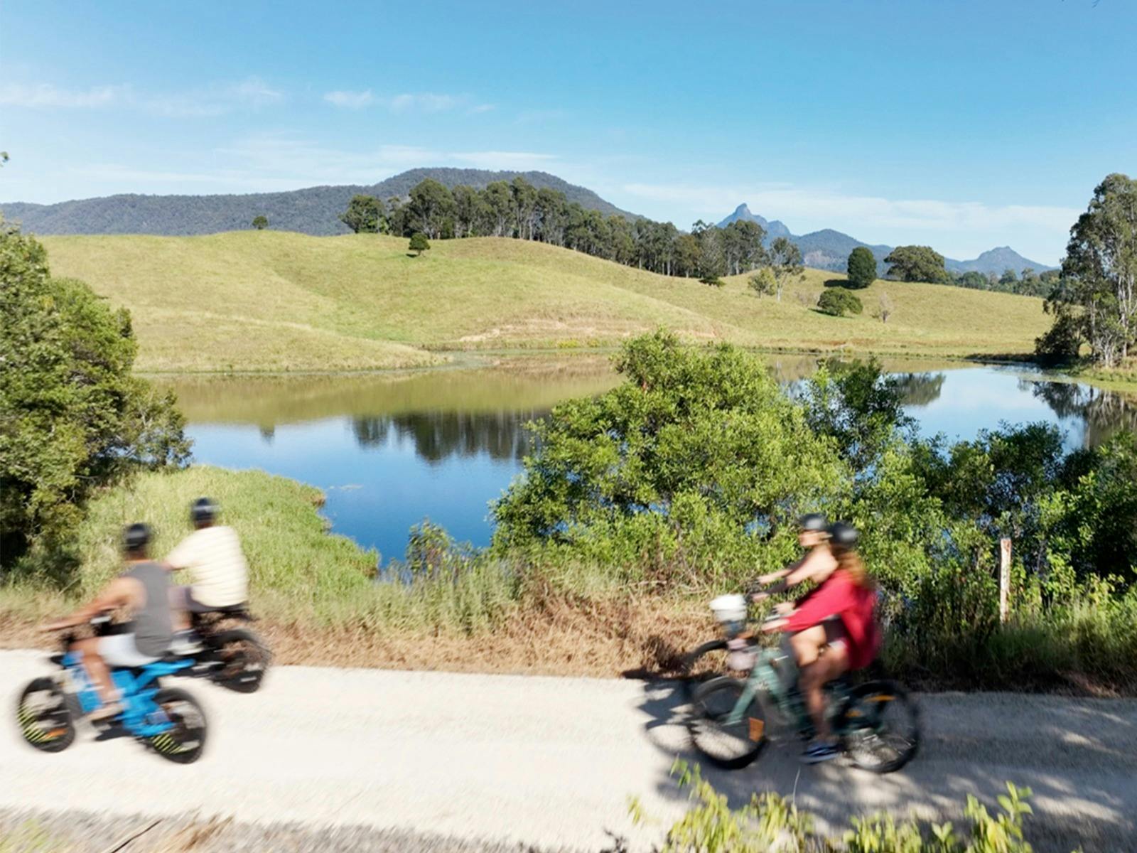 Electric Bikes from Freedom Machine Murwillumbah Bike hire riding on the Northern Rivers Rail trail.