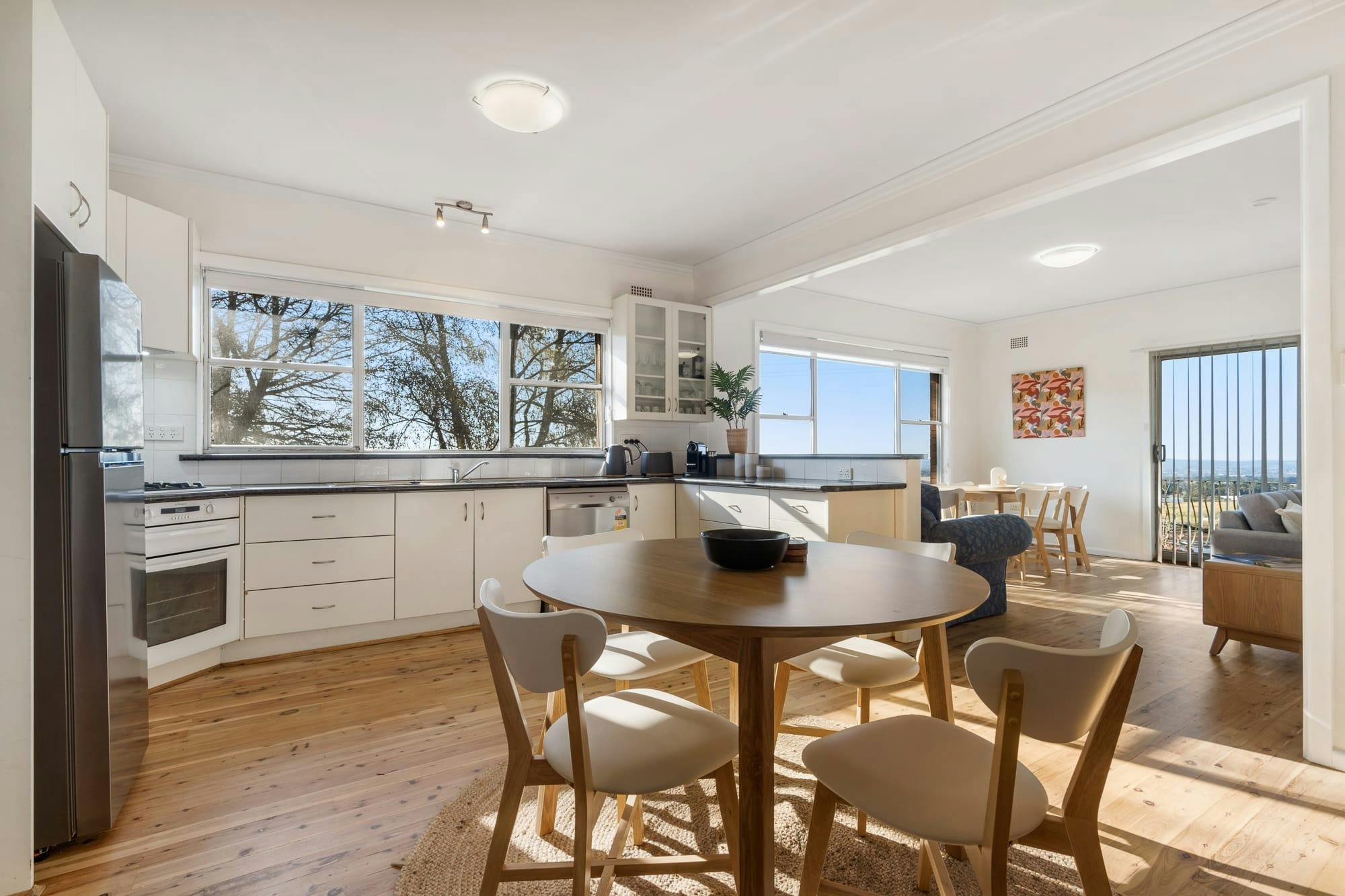 Lovely opening space so everyone can spend time together doing different things in the home.