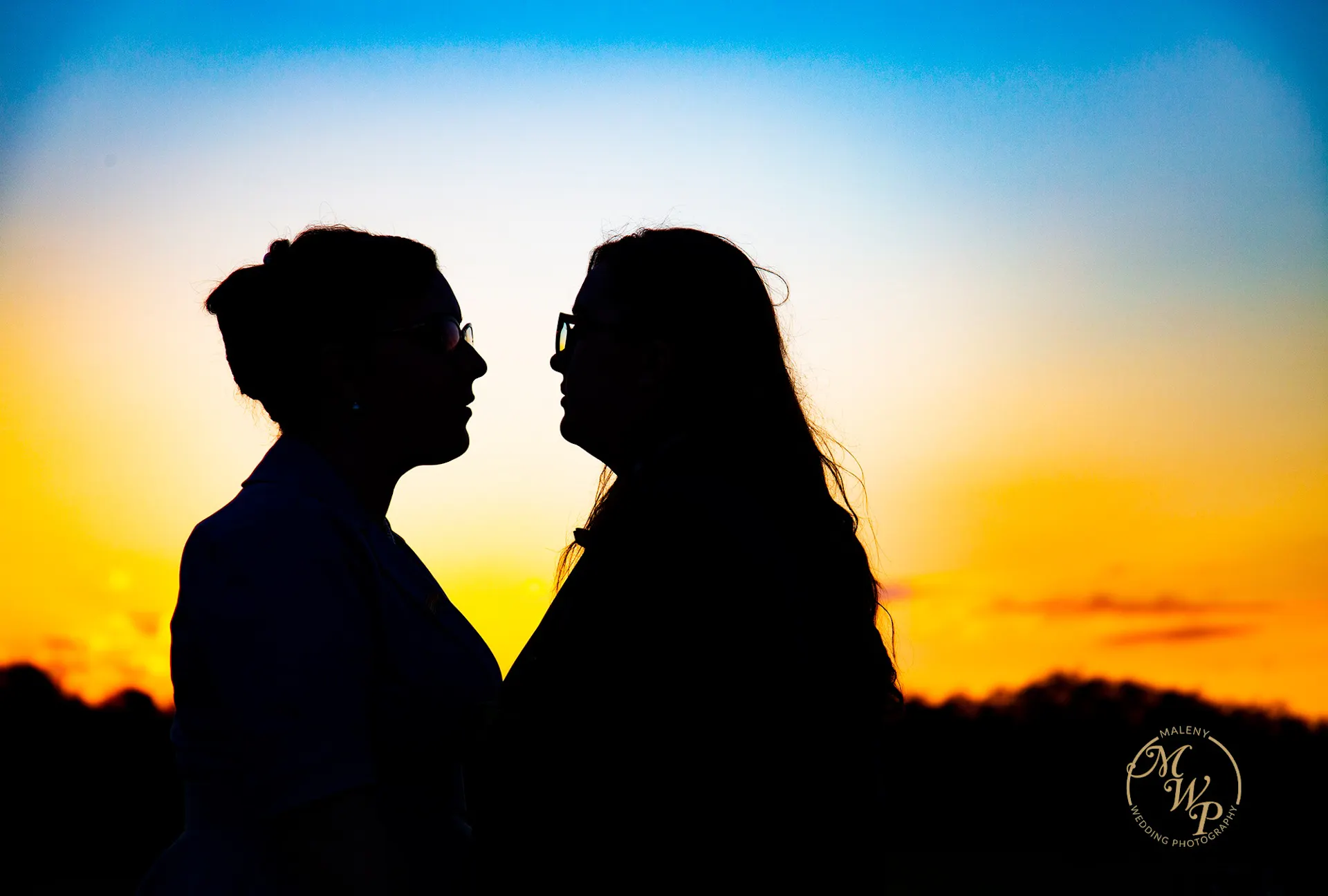 Same sex wedding couple sunset at Maleny Retreat Malenyweddingphotography