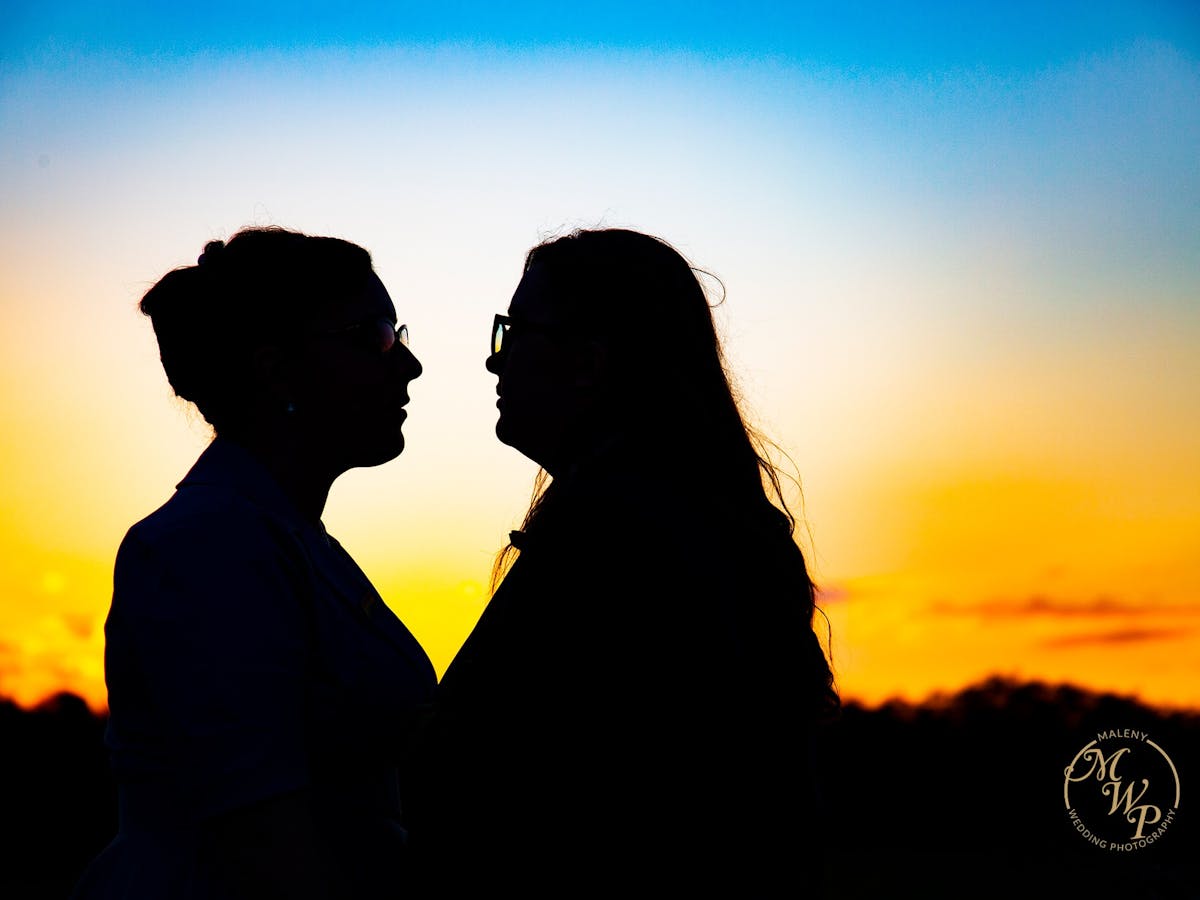 Same sex wedding couple sunset at Maleny Retreat Malenyweddingphotography