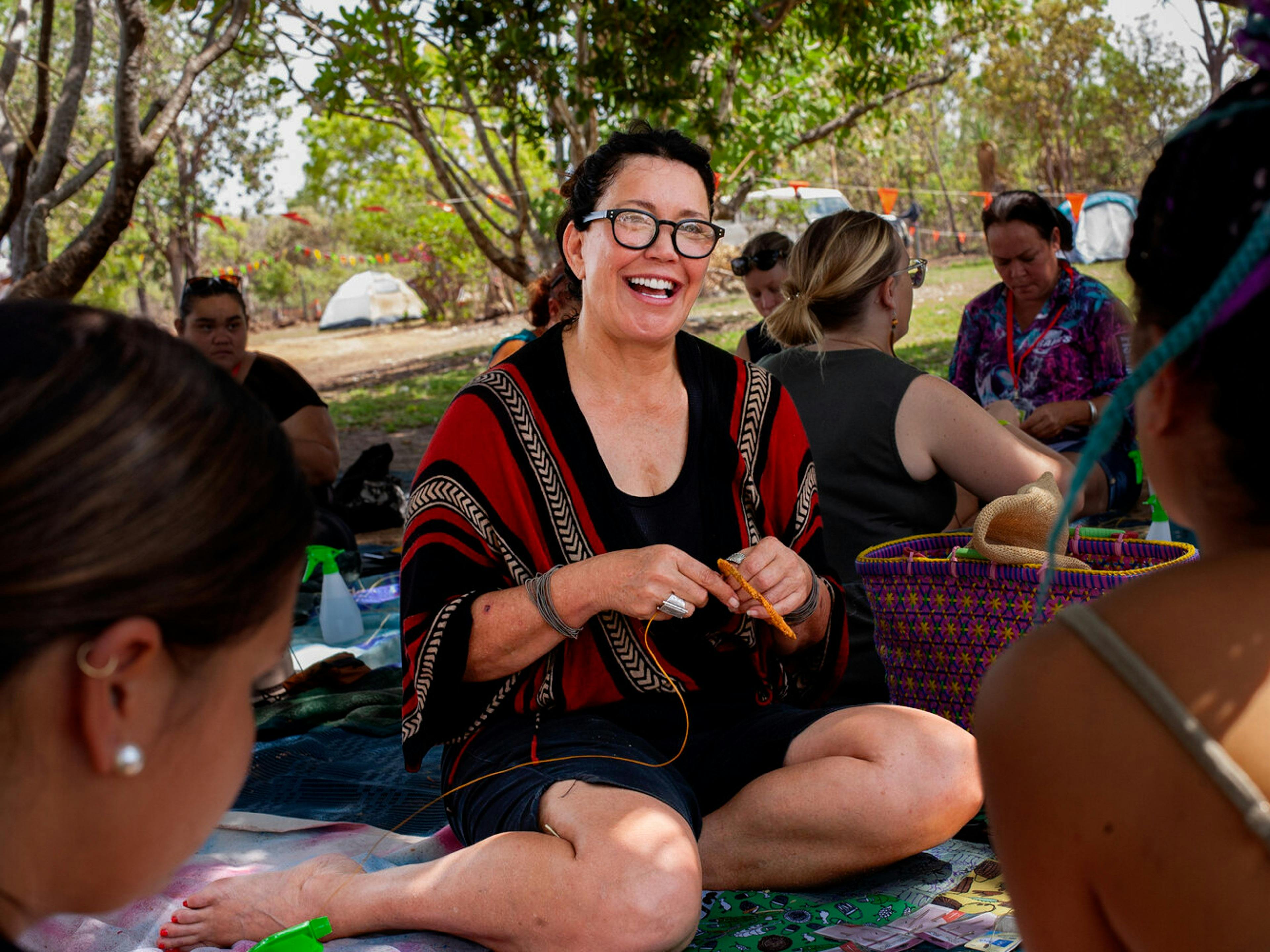 Woman weaves her own bangle to take home