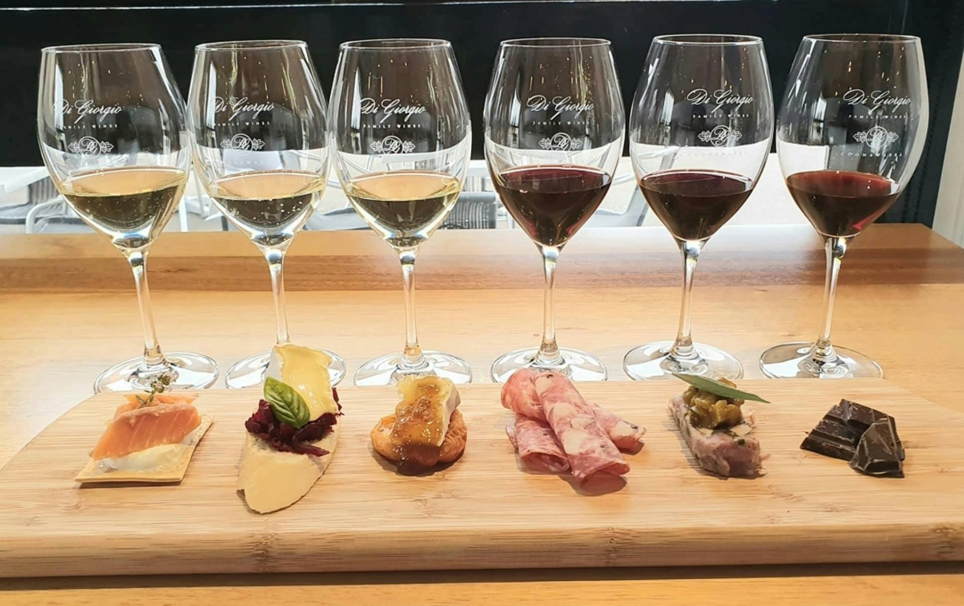 WIne tasting experience 6 flights with 6 Bites