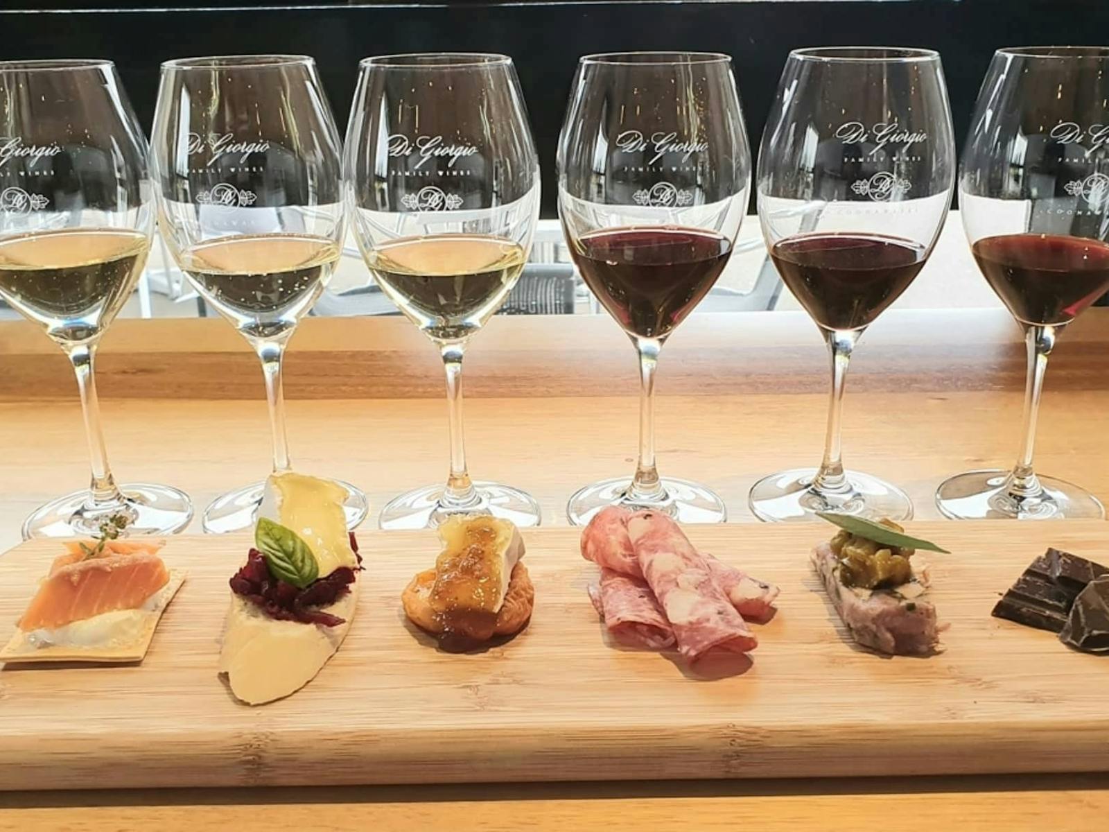 WIne tasting experience 6 flights with 6 Bites