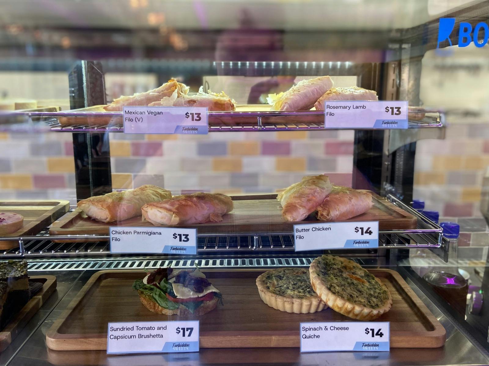 Various beautiful sweet treats in perfect lines.