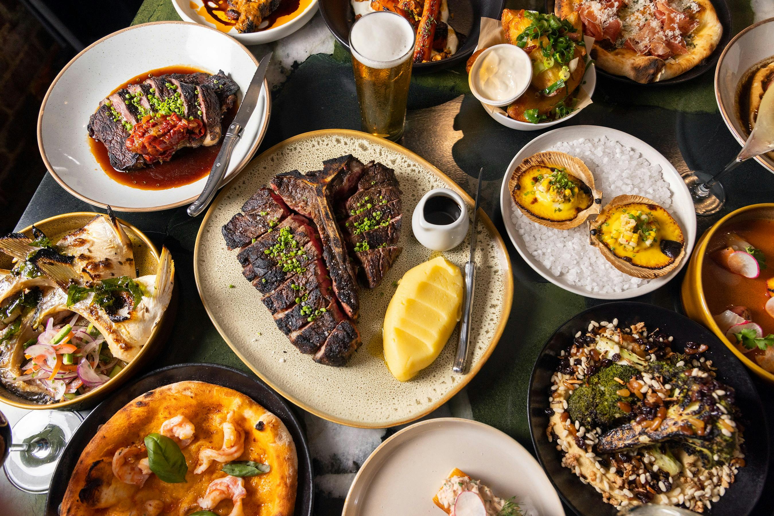 Cooking over charcoal and locally brewed beer and wine