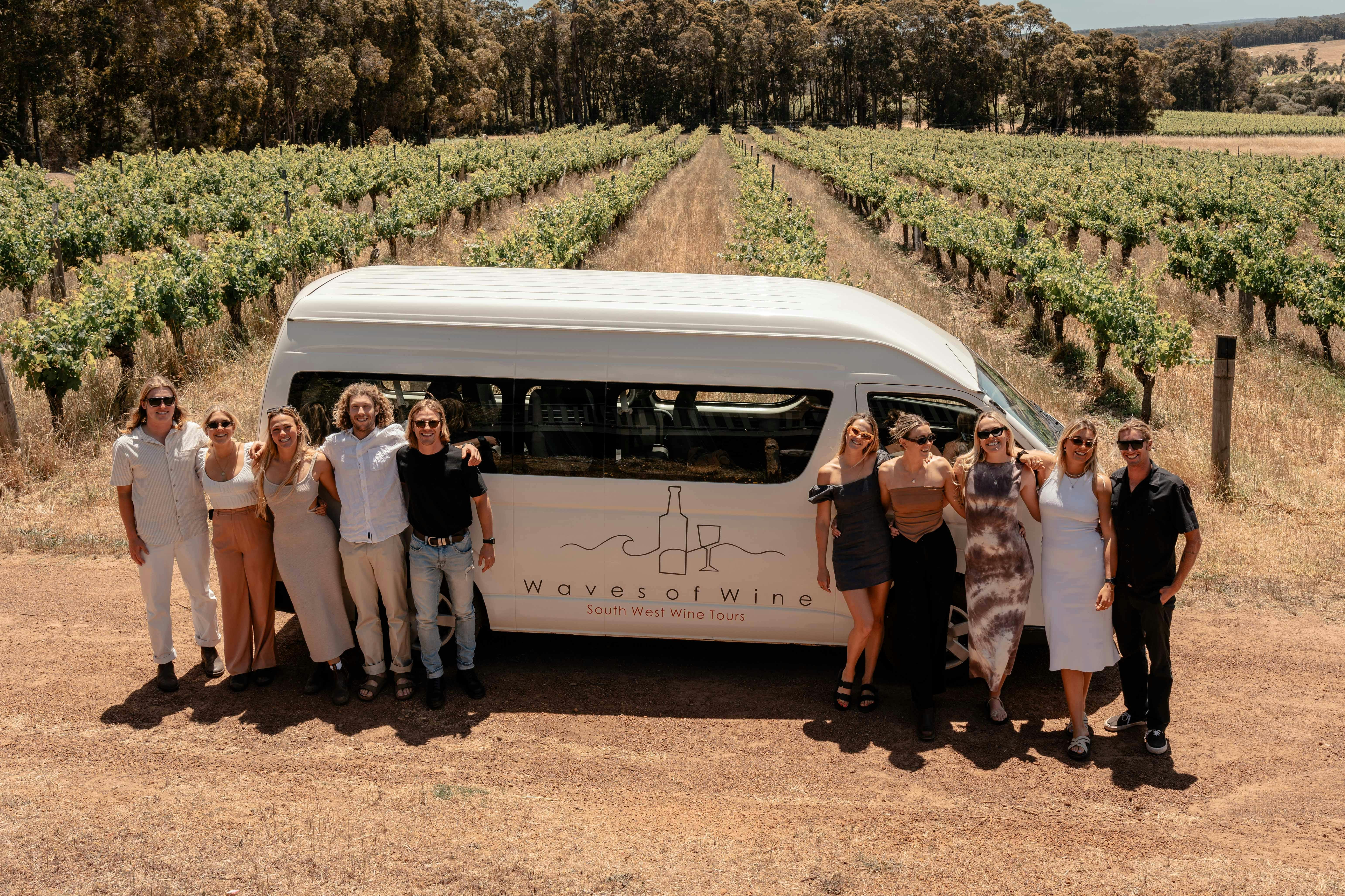 A mini-van in a vineyard.