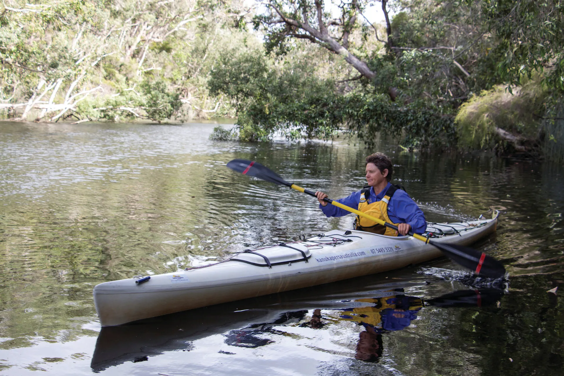 Woman in canoe, in Upper Noosa River.