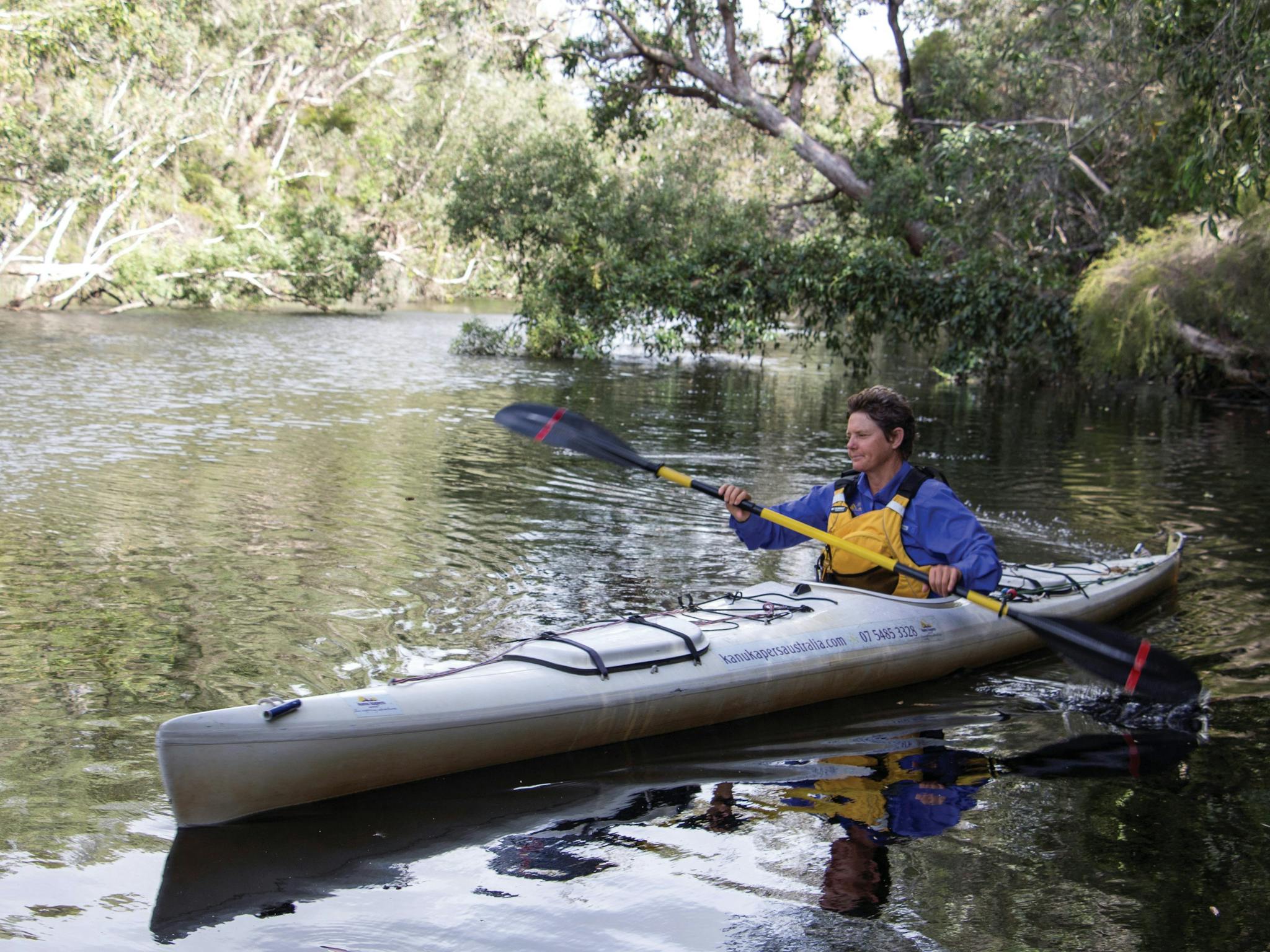 Woman in canoe, in Upper Noosa River.