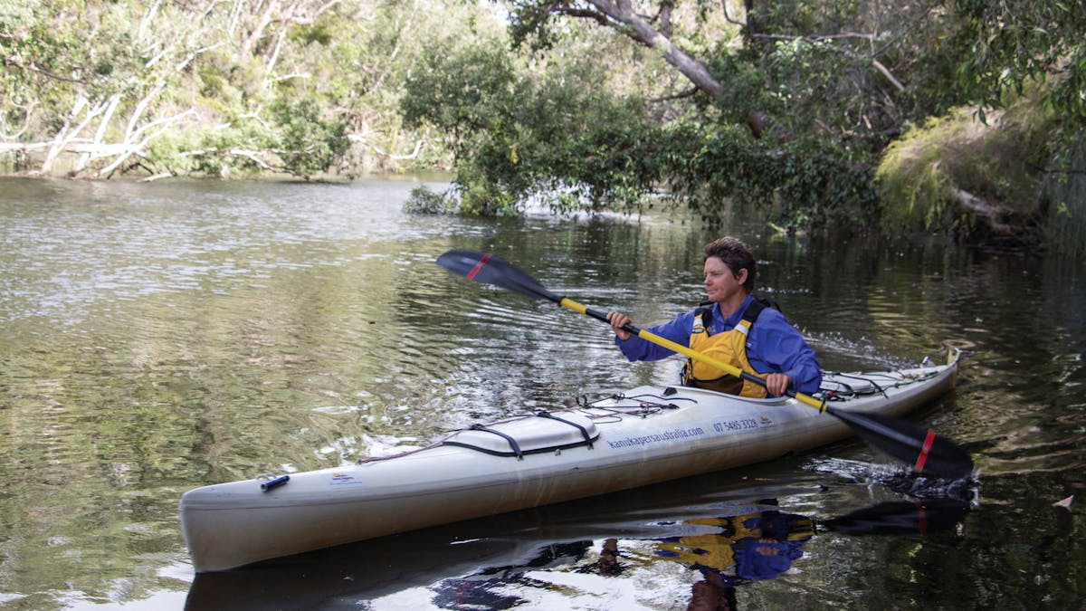 Woman in canoe, in Upper Noosa River.
