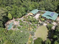 Aerial view of the main house and accommodation block at Licuala Lodge