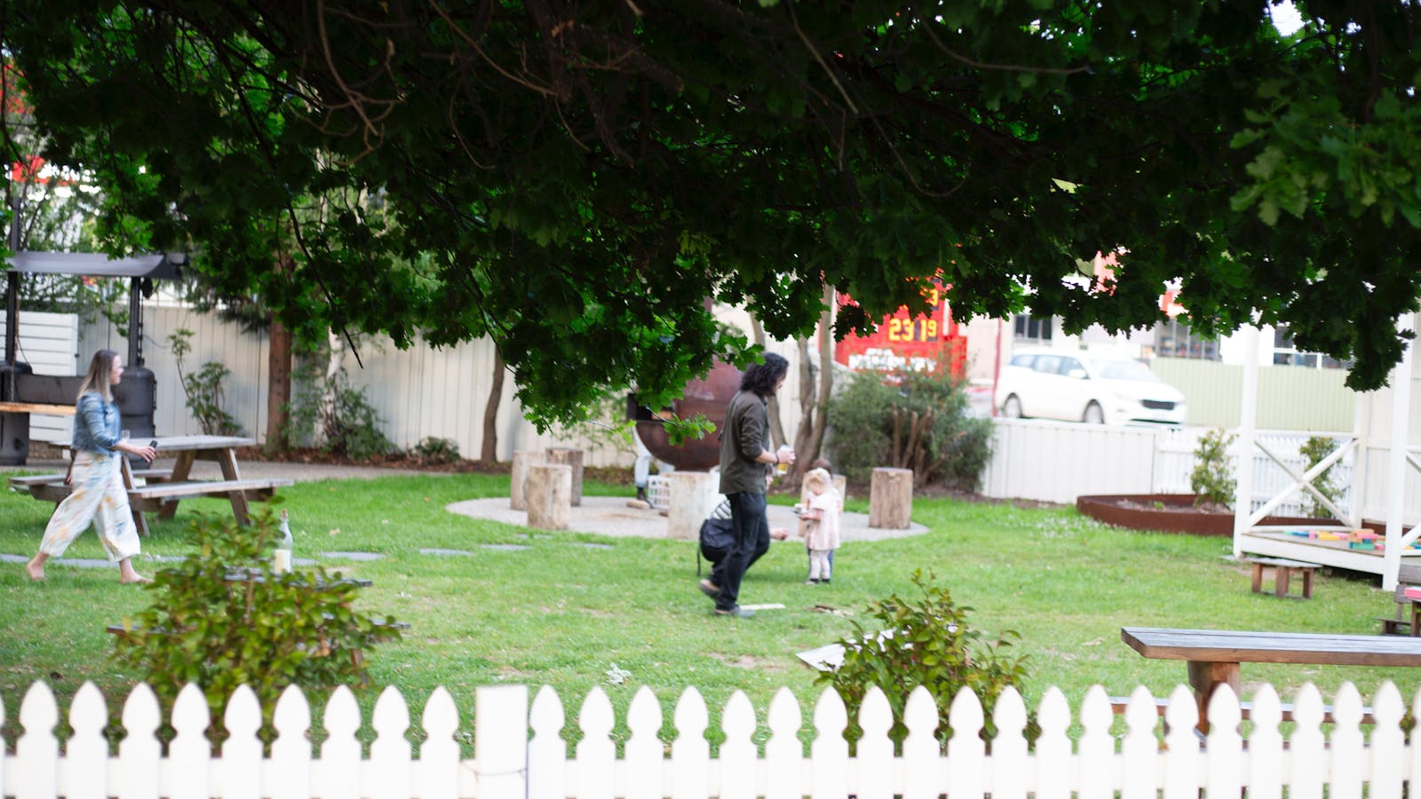 Looking through the century old Magnolia Tree to our outdoor space