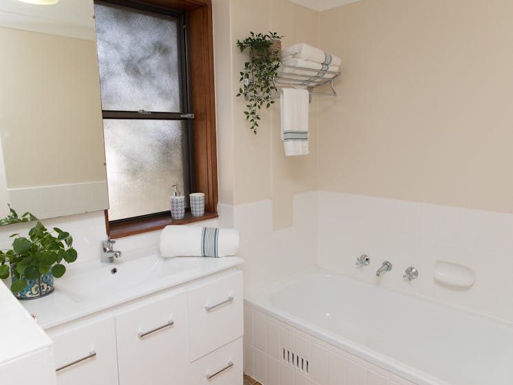 Taranaki Beach House | Opposite Town Beach - Main Bathroom