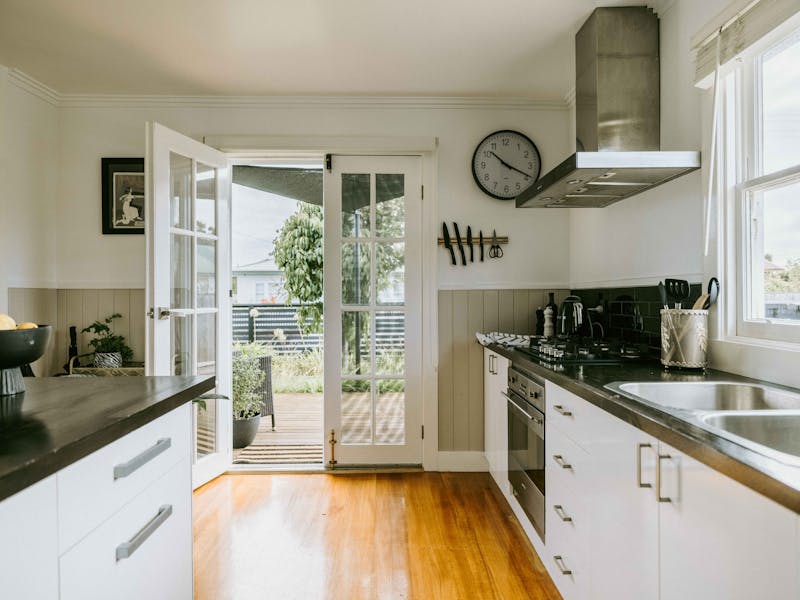 Enjoy cooking in the fully equipped kitchen with sleek, modern appliances.