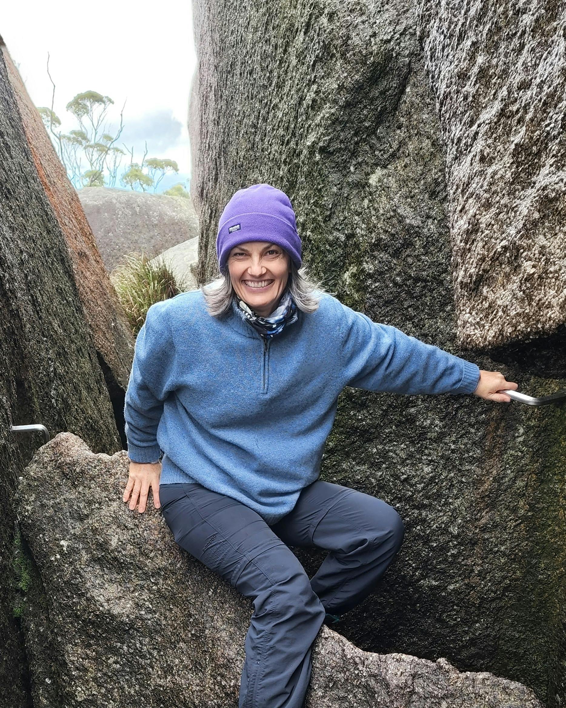Albany Tours guests clambering over rocks