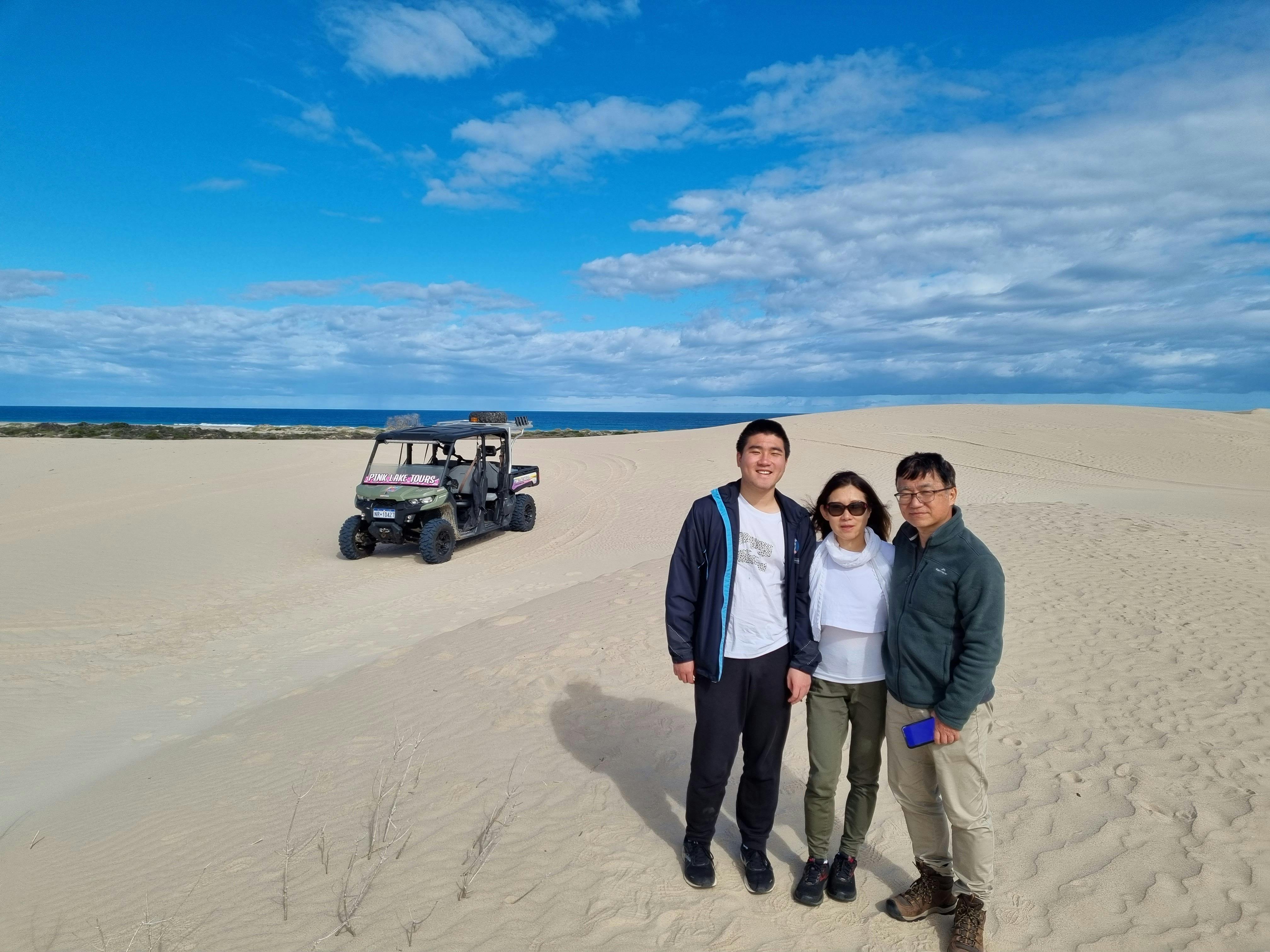 Family in the dunes on tour