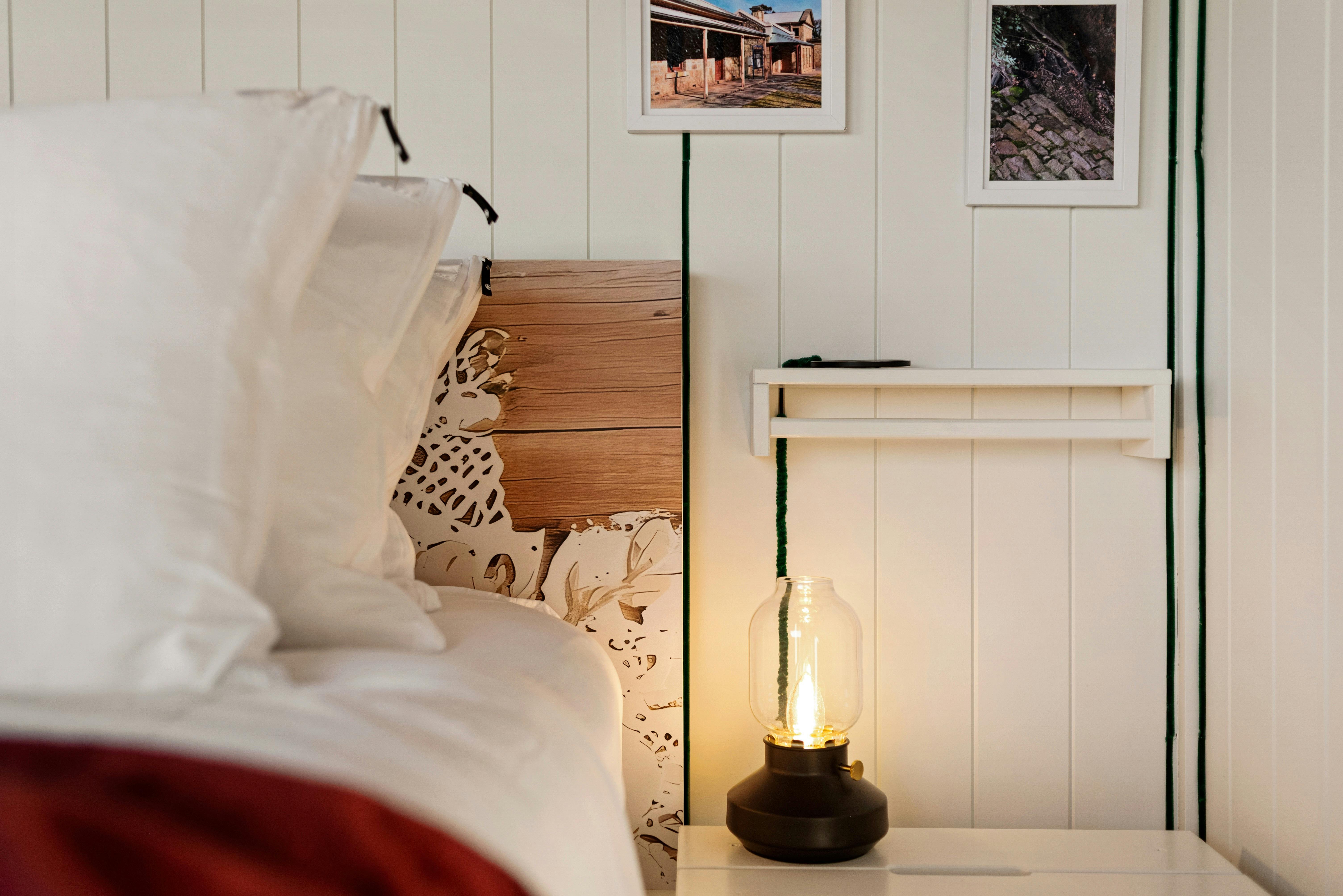 Bedside lamp, pillow and bedhead