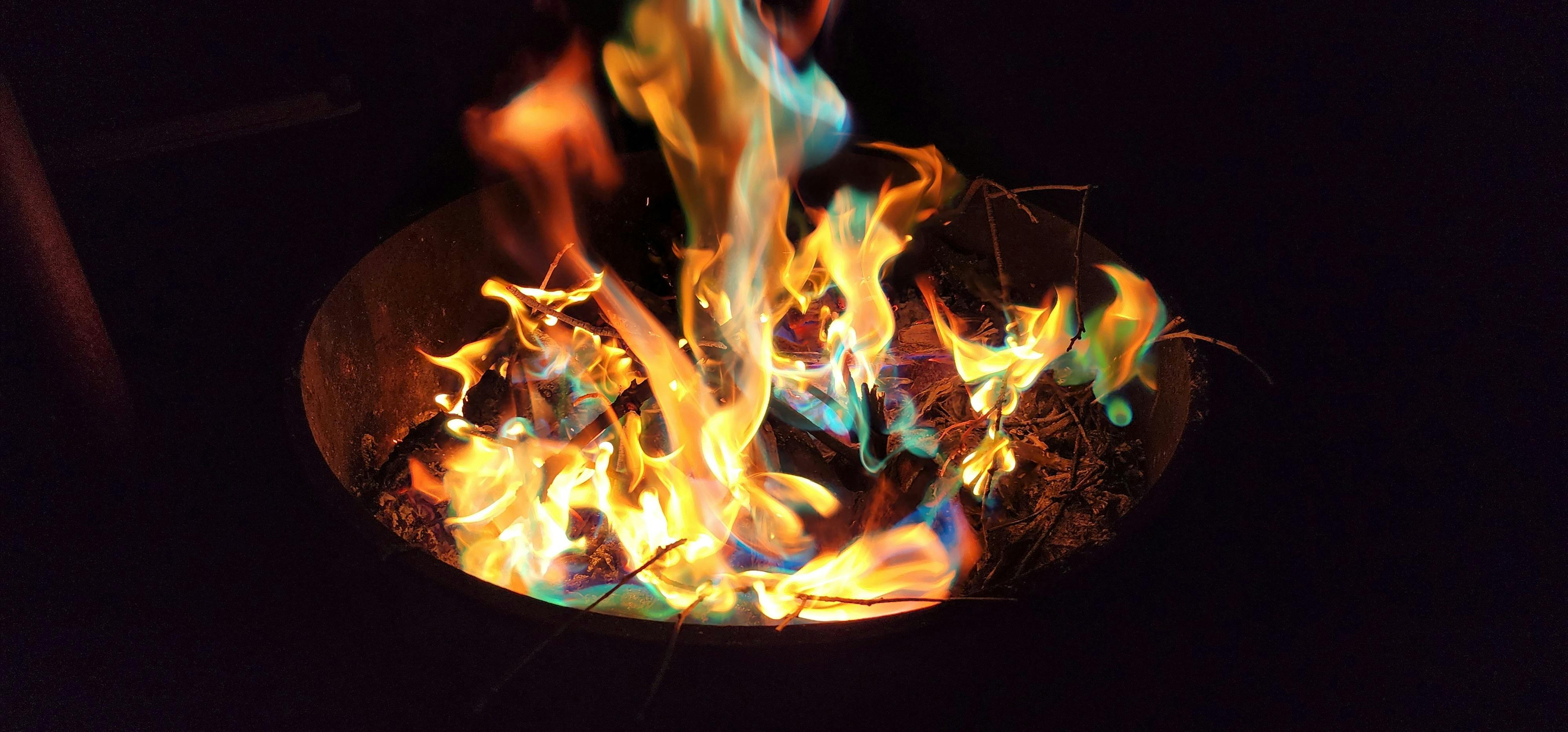 Close up of yellow and orange large campfire flames
