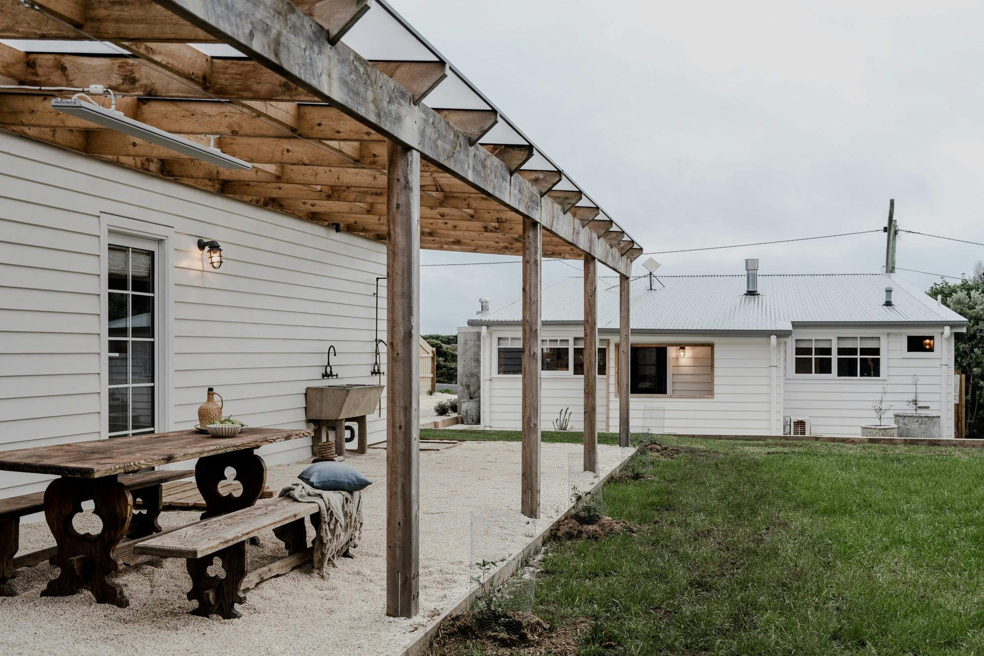 Outdoor showers and long lunches at the old oak table.
