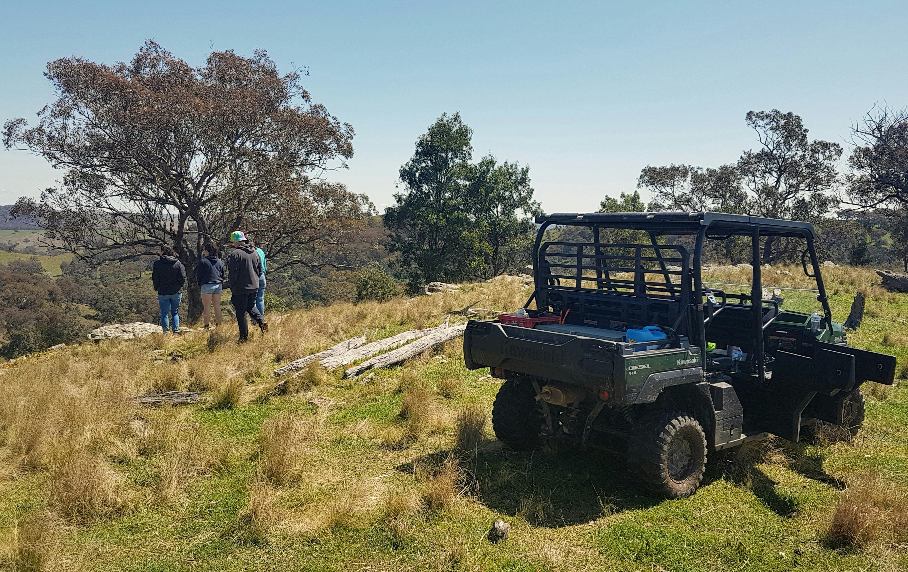 Piambong Creek Farm Tour buggy on top of lookout over Mudgee Region with a group of friends