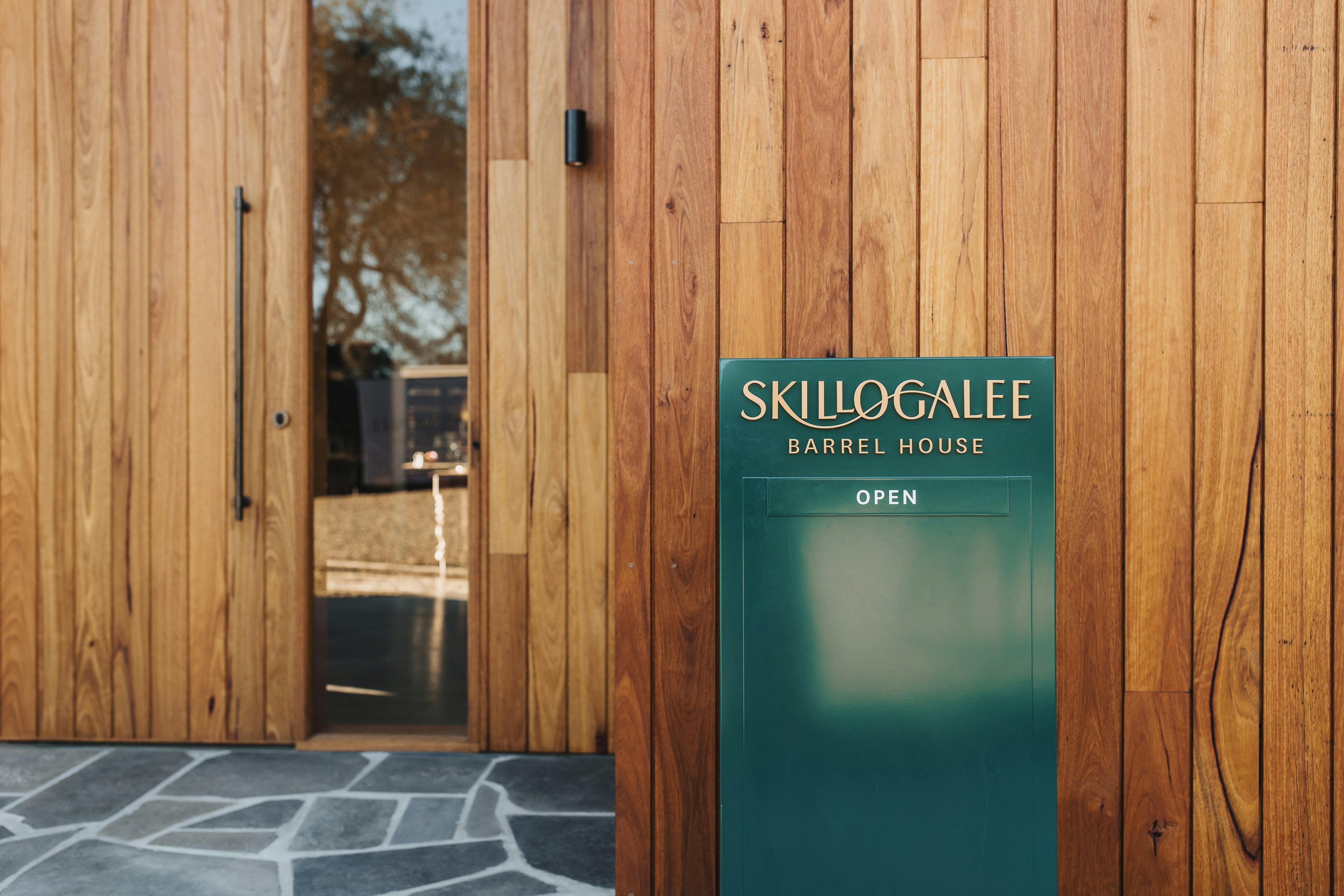 An "open" sign outside the Barrel House