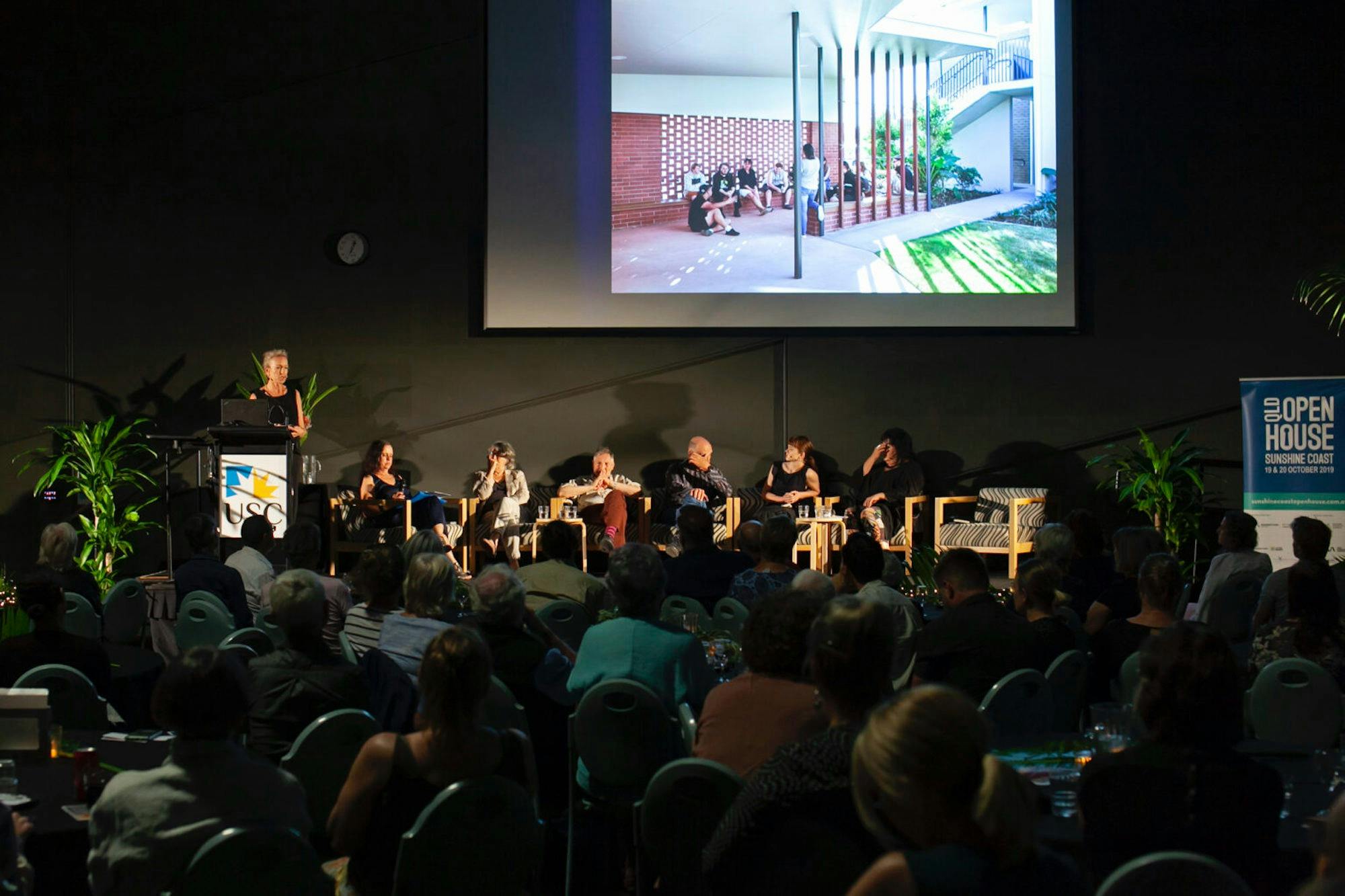 Speakers in a panel discussion