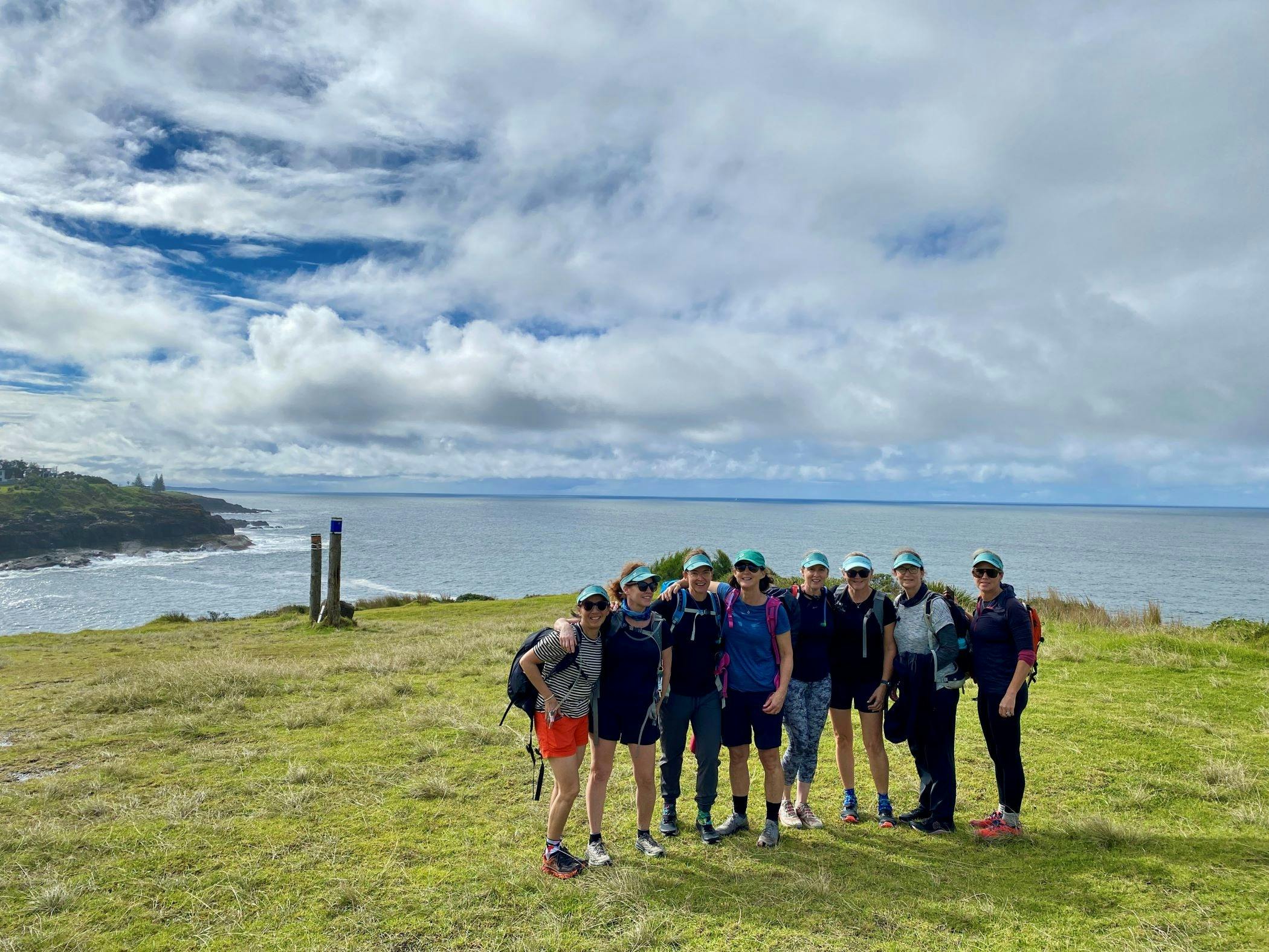 Group gathering on coastal track