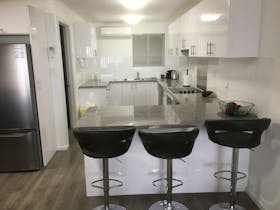 Modern appliances including coffee pod machine.