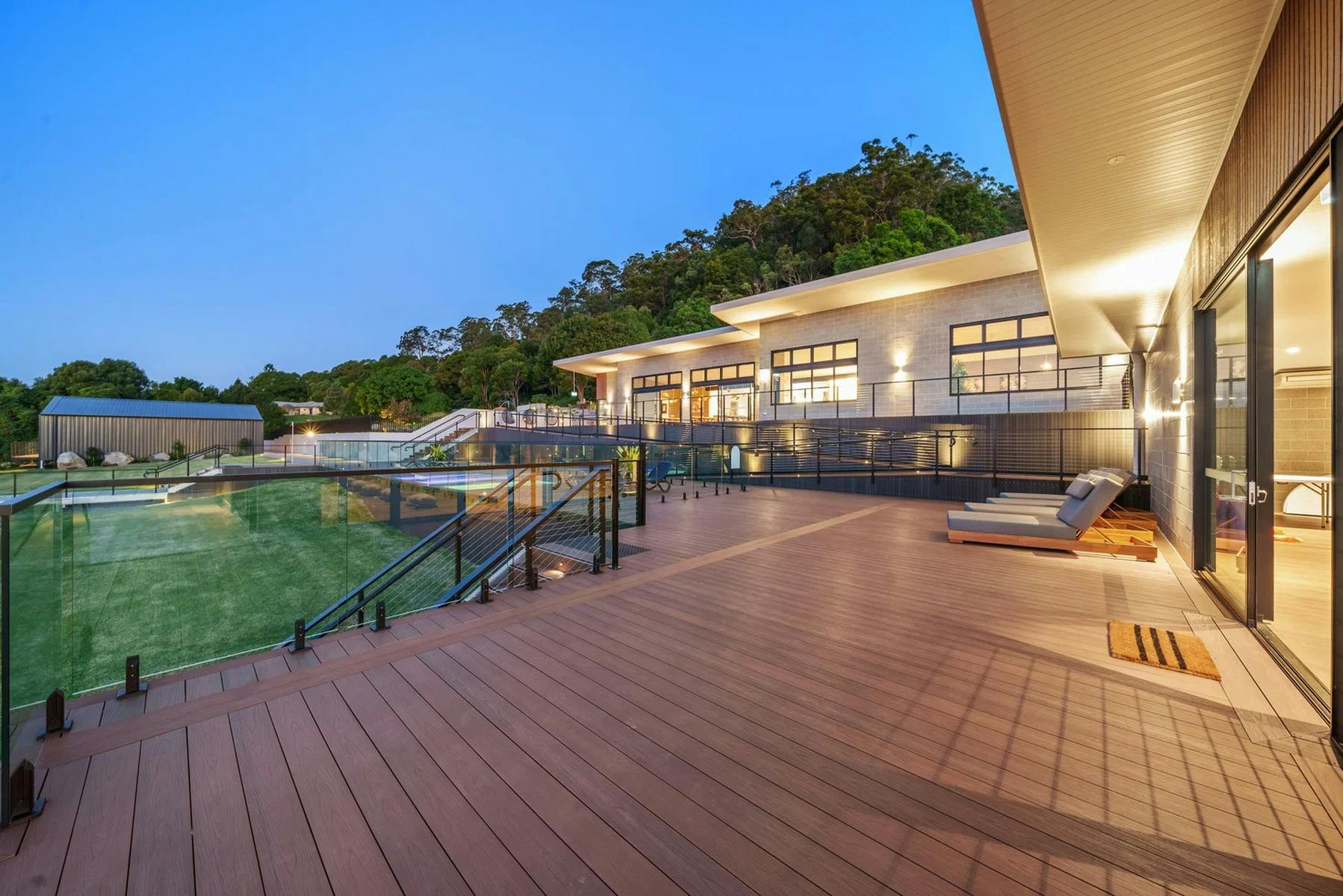 The spacious poolside deck and shared facilities at EcoView Retreat in the Gold Coast Hinterland.