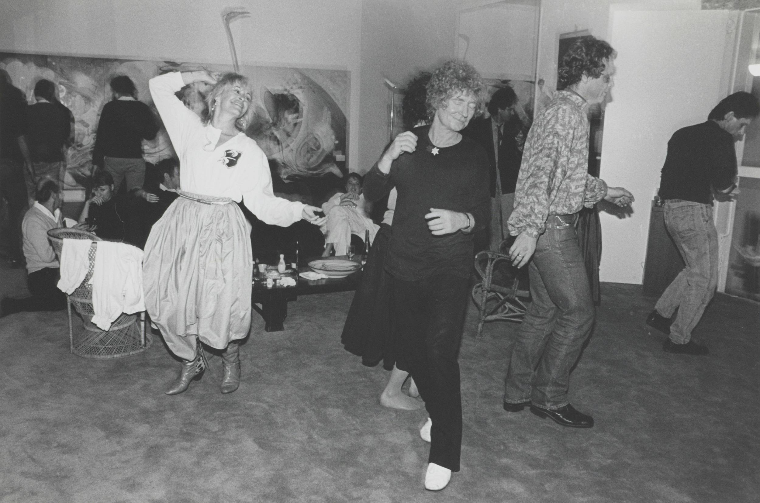 Photo of Brett Whitely dancing at a studio party