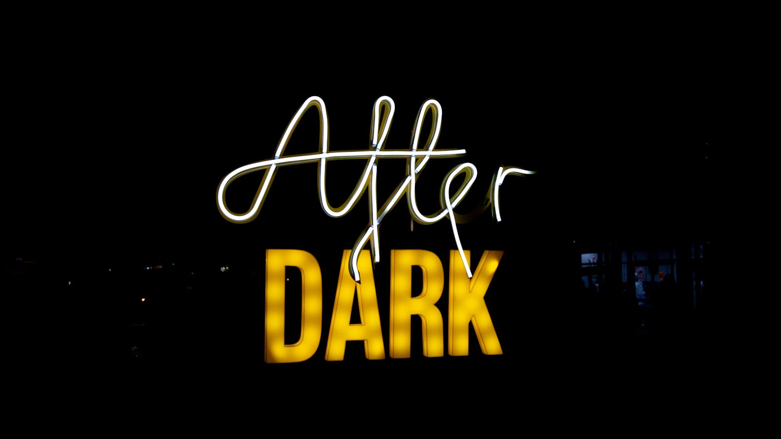 Neon sign saying After Dark