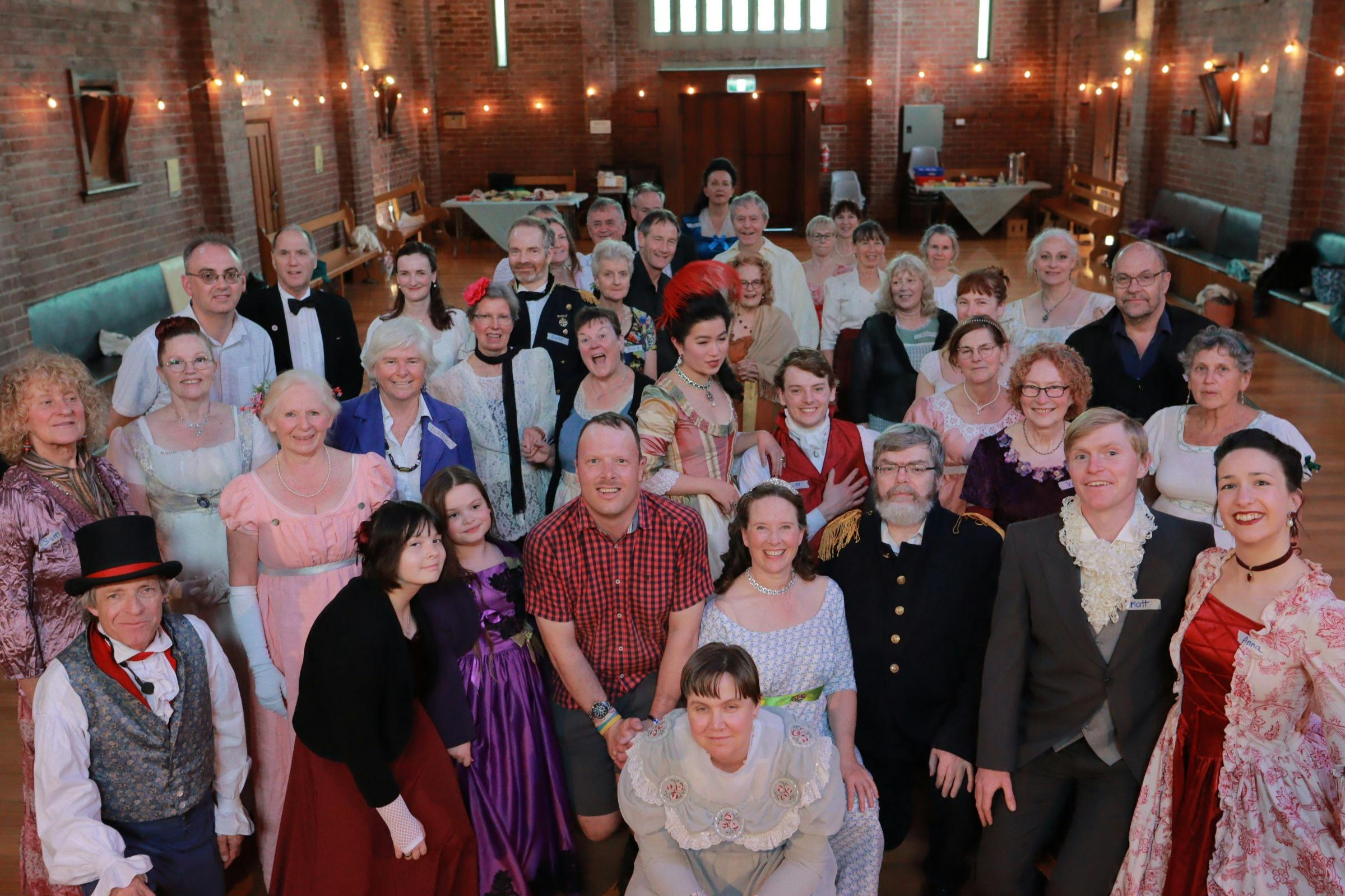 people in Regency costumes at the Regency Ball
