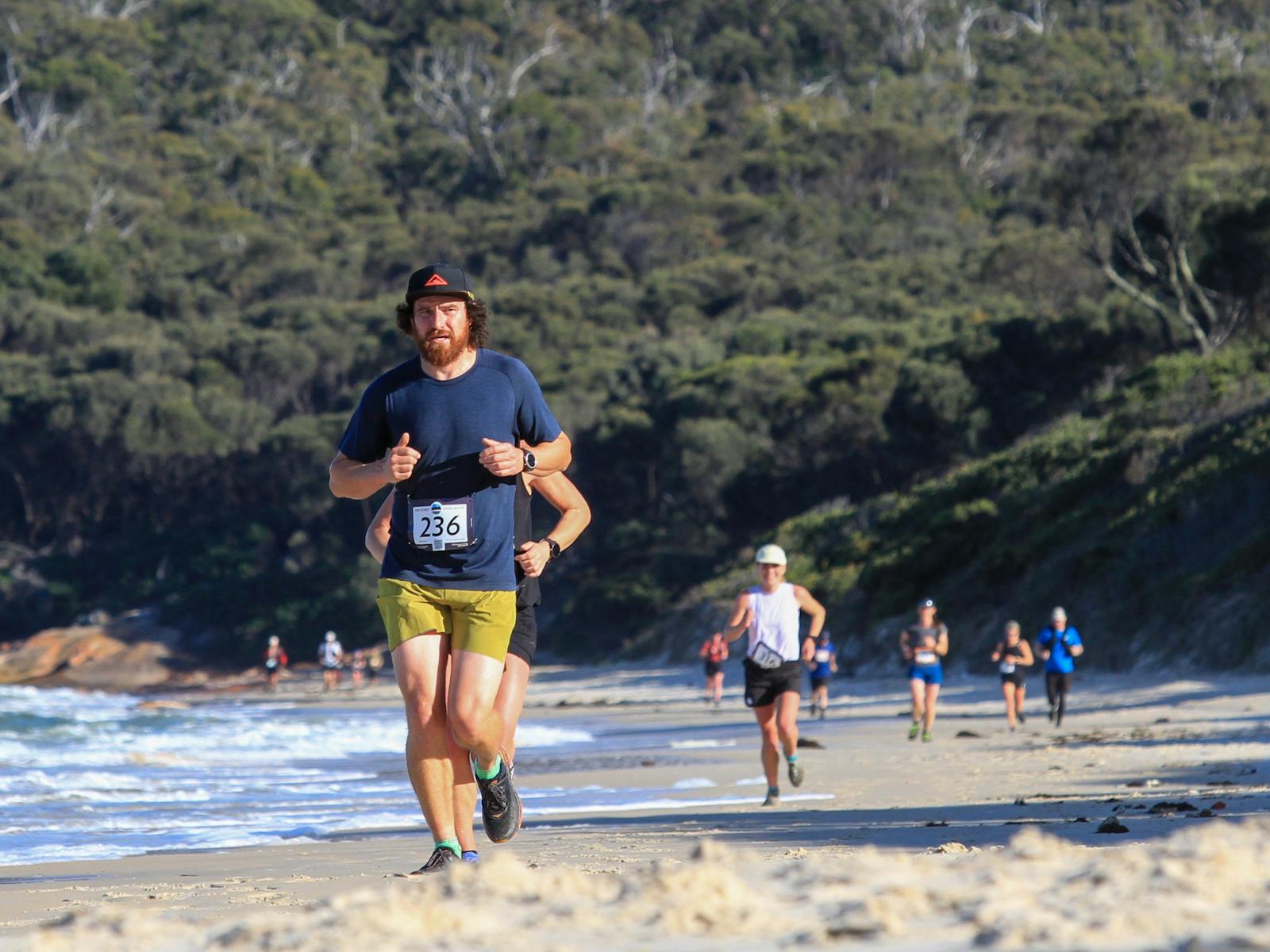 Running in the Trail Run stage of the Freycinet Challenge at Coles Bay in Tasmania.